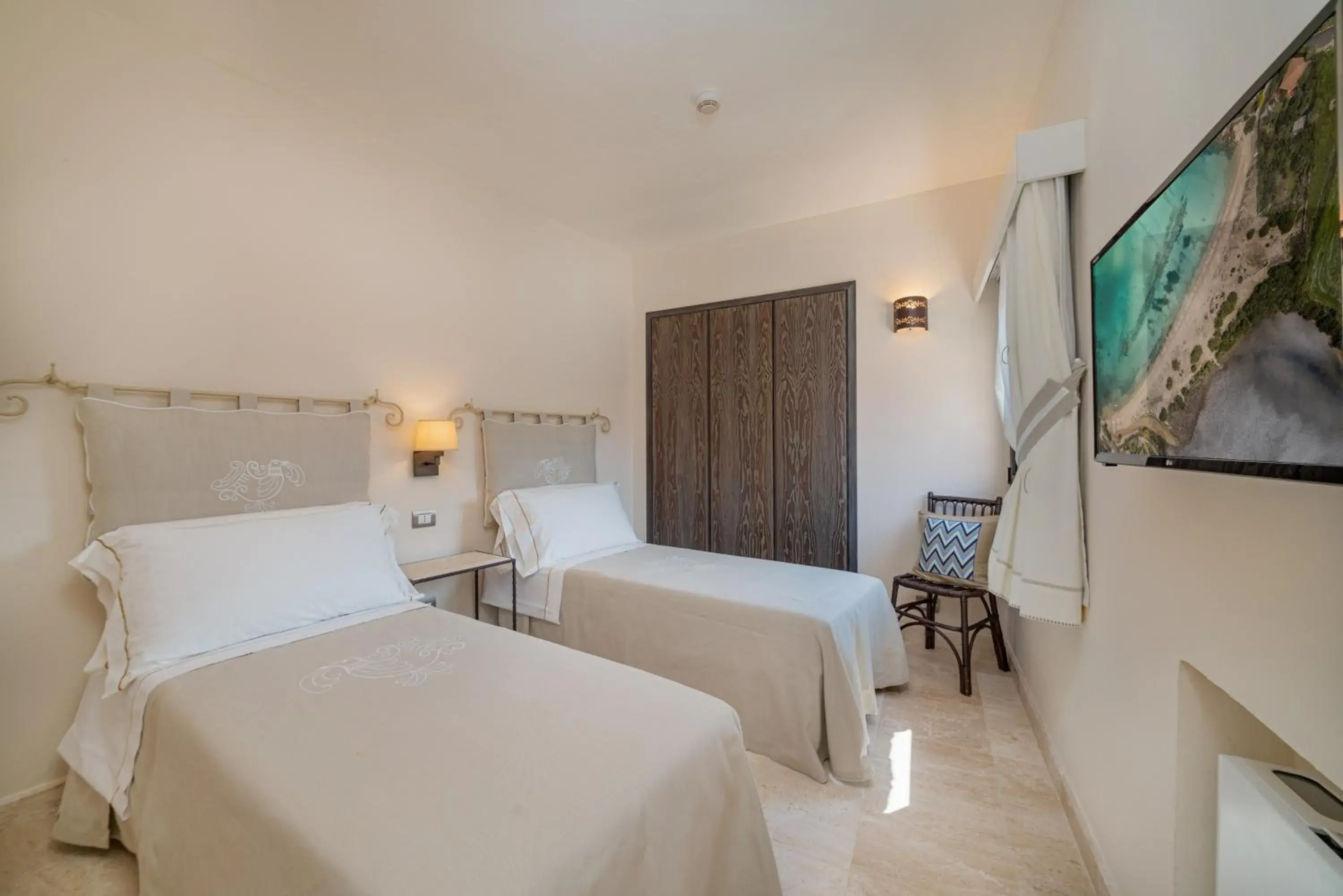 Prestige Two Bedroom Family Room with Partial Sea View in Hotel Cala Lunga Prestige Two Bedroom Family Room with Partial Sea View in Hotel Cala Lunga