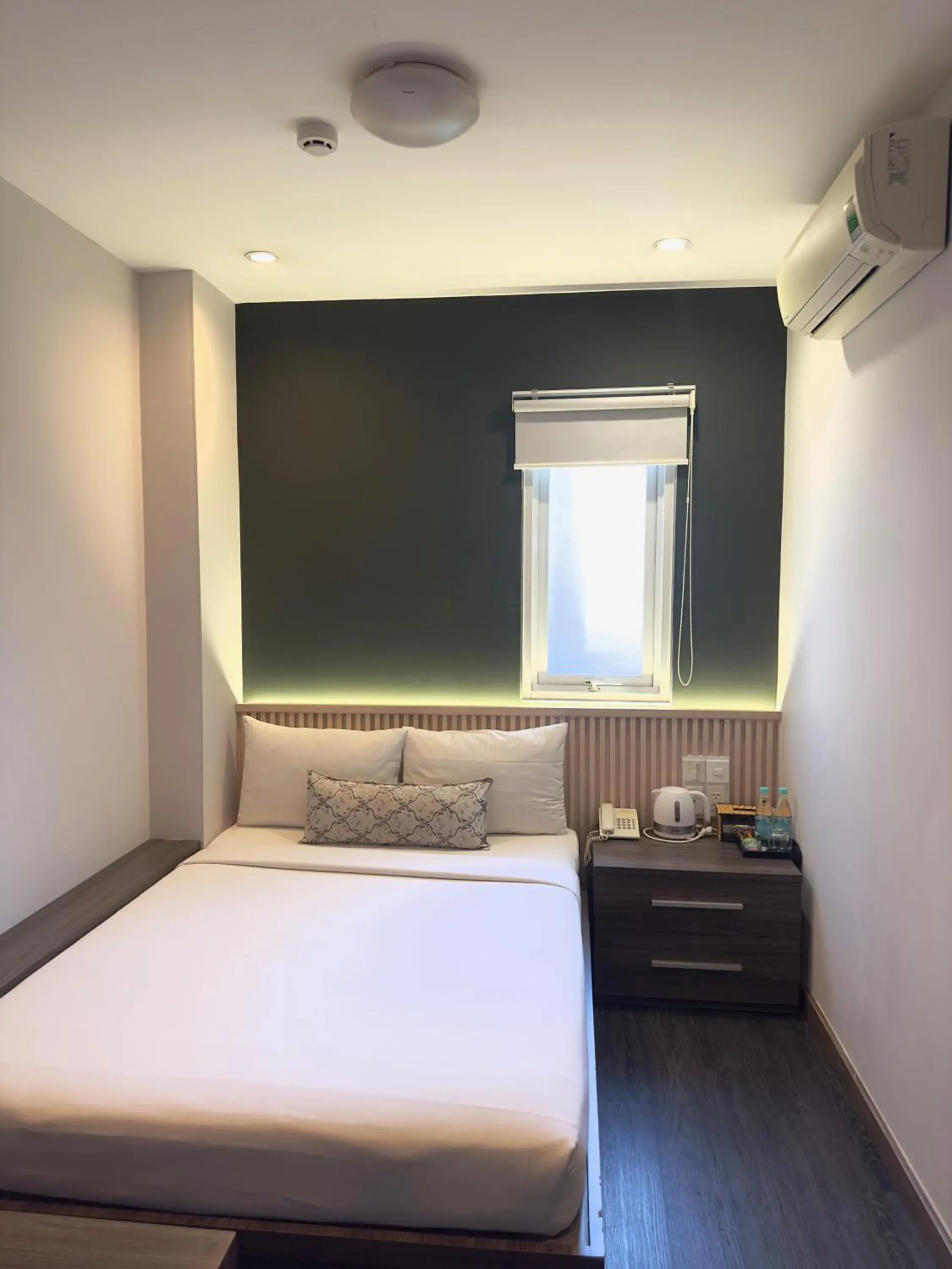 Bed in Iris Hotel Bed in Iris Hotel