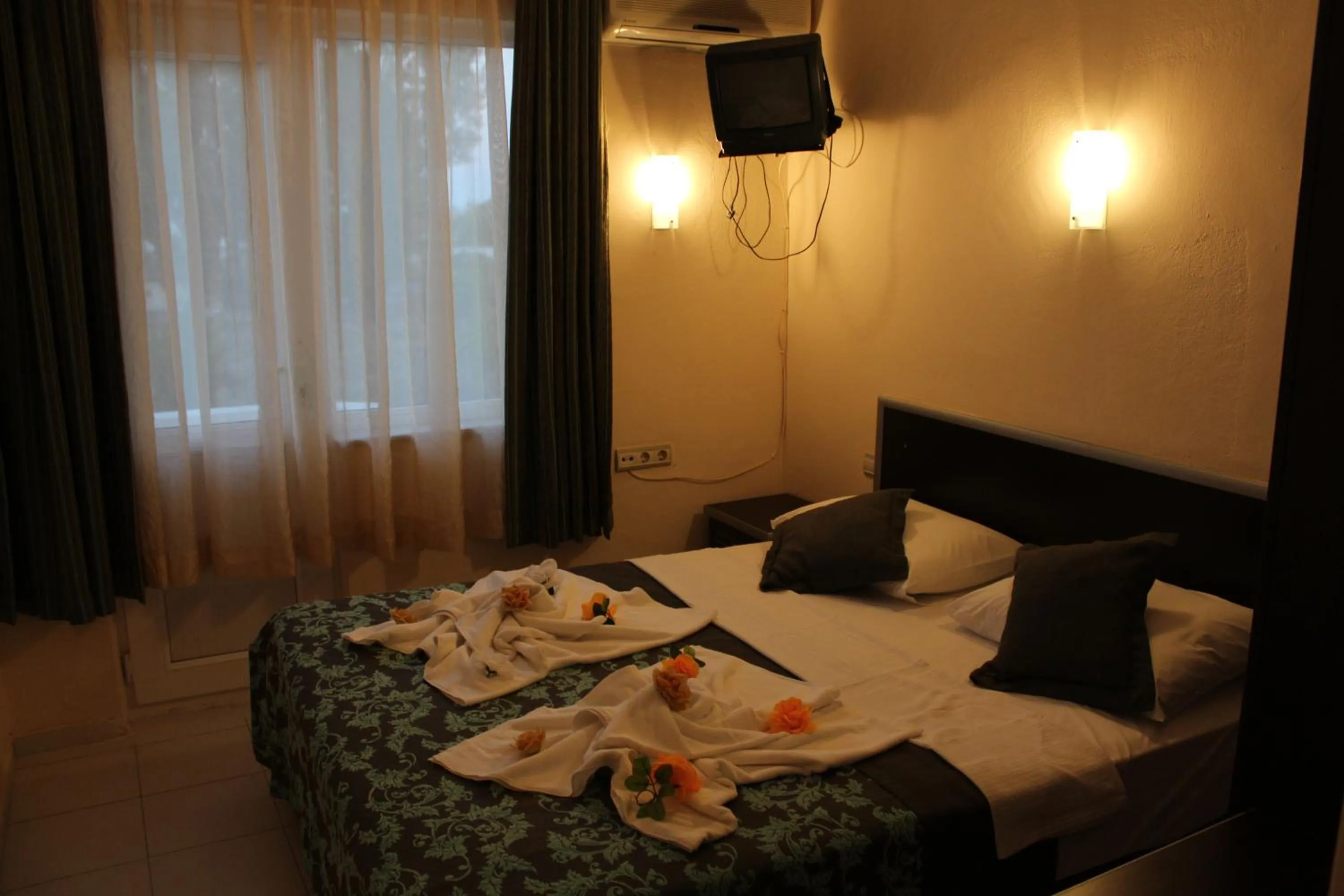 towels, Bed in Hotel Gold Stone