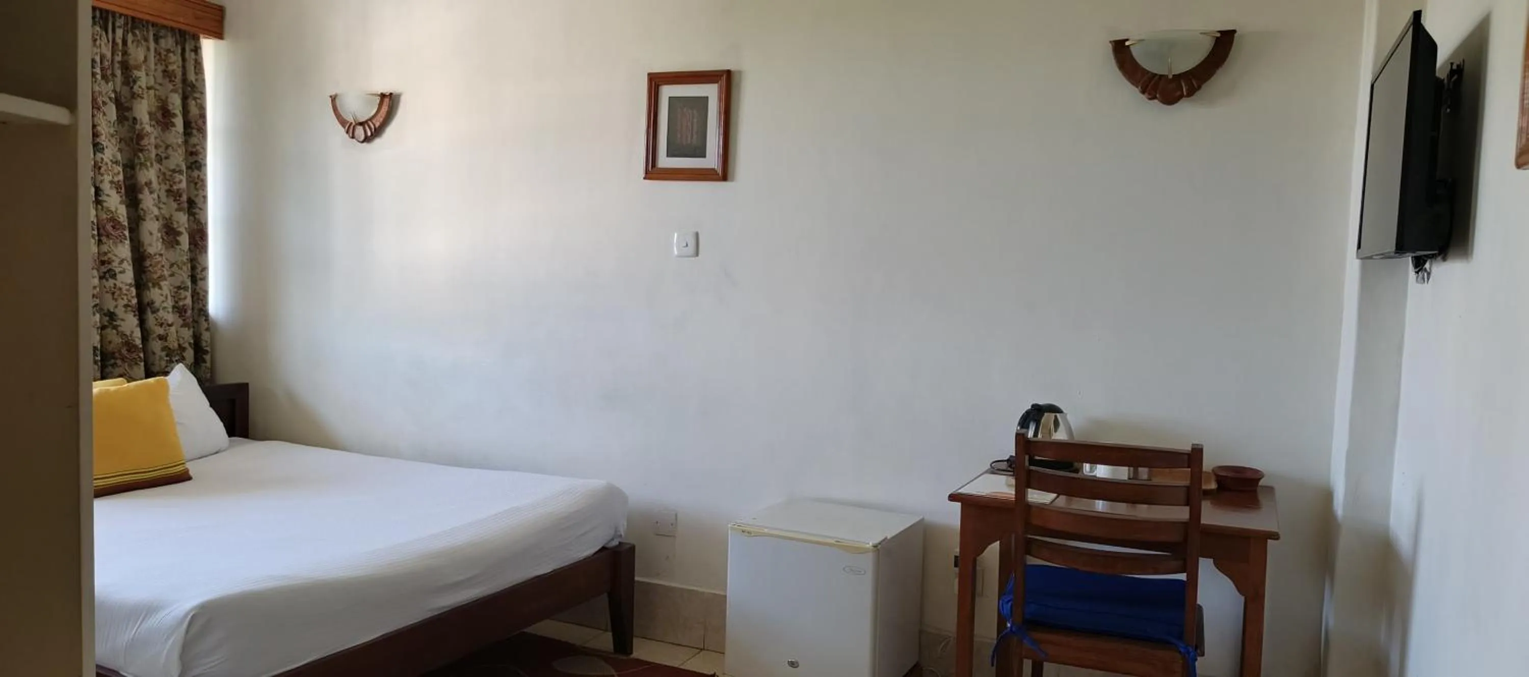 Bed in Kenya Comfort Hotel