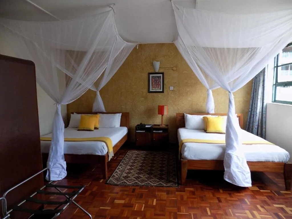 Bed in Kenya Comfort Hotel