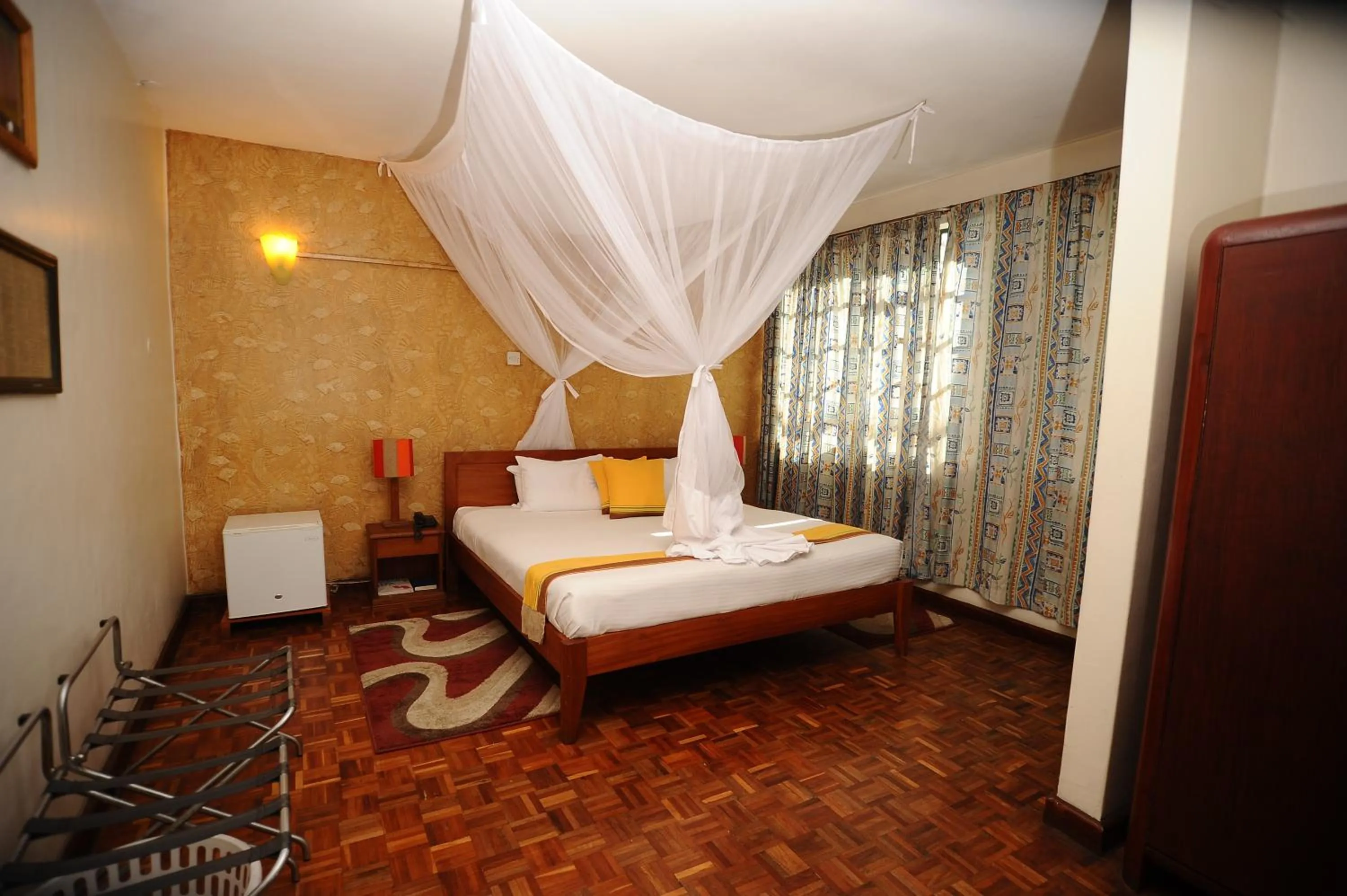 Photo of the whole room, Bed in Kenya Comfort Hotel