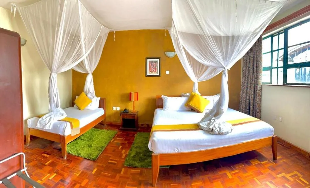 Bedroom, Bed in Kenya Comfort Hotel