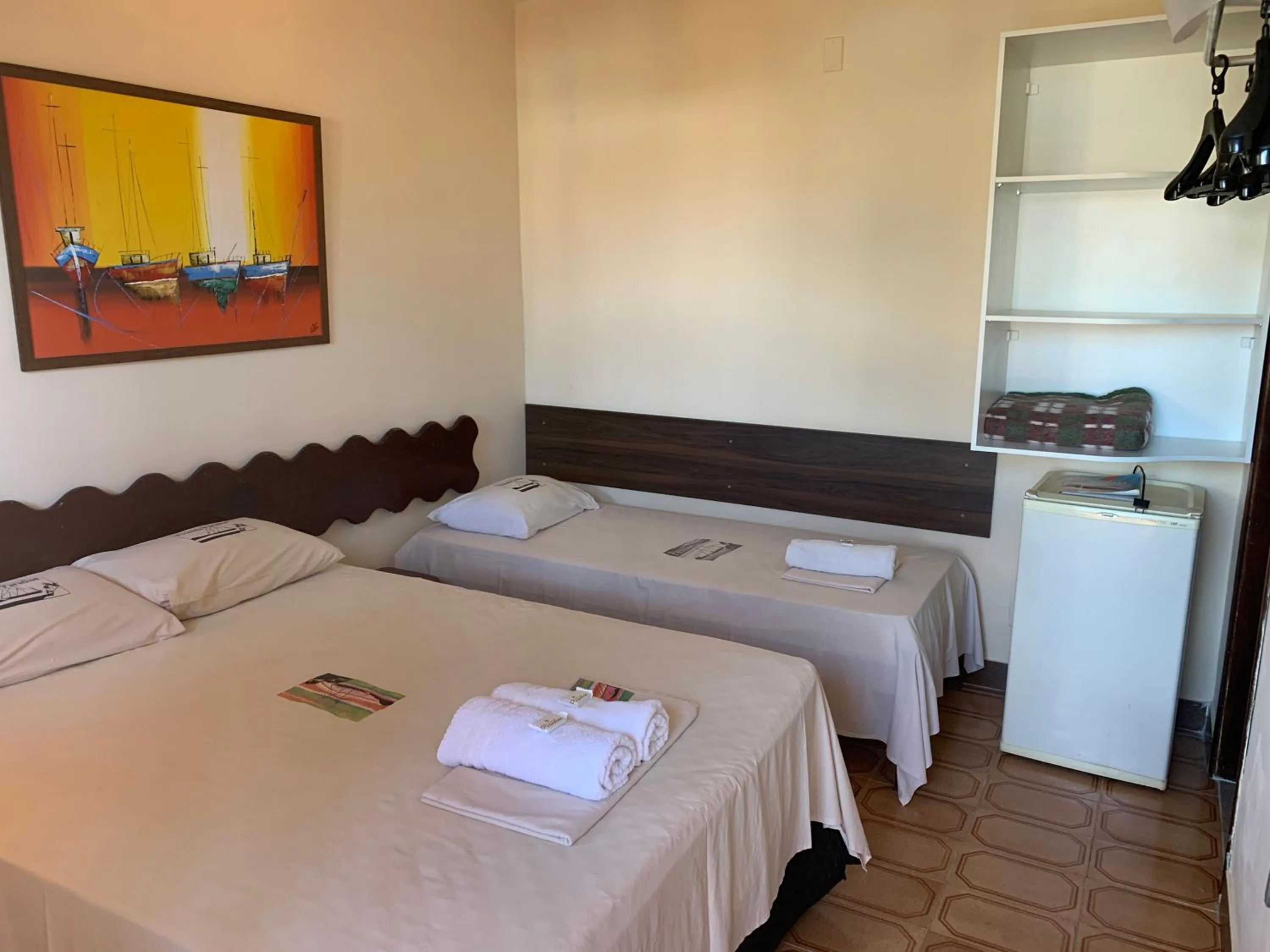 Bed in Pousada Paradise