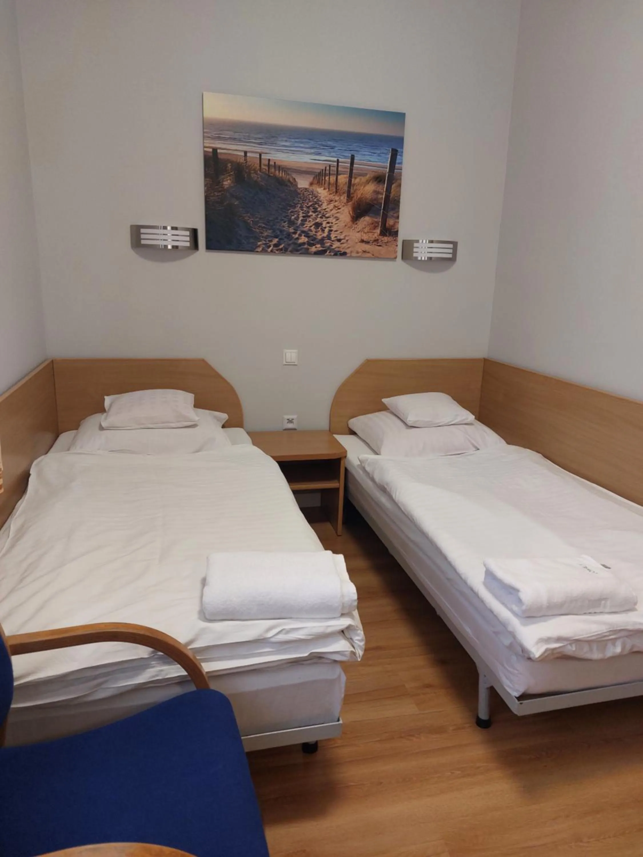 Bed in Motel Comet