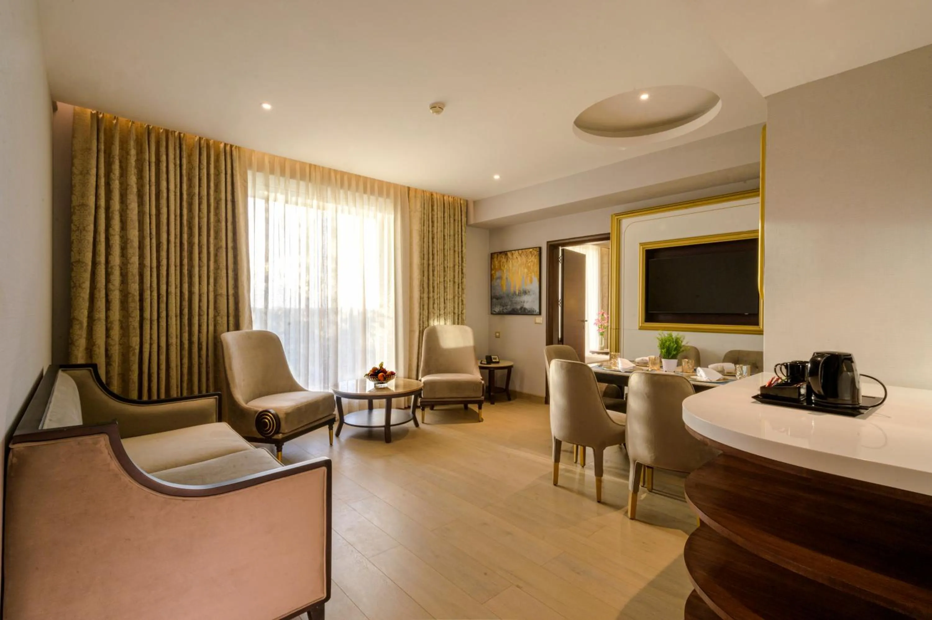 TV and multimedia in Taj Gandhinagar Resort and Spa