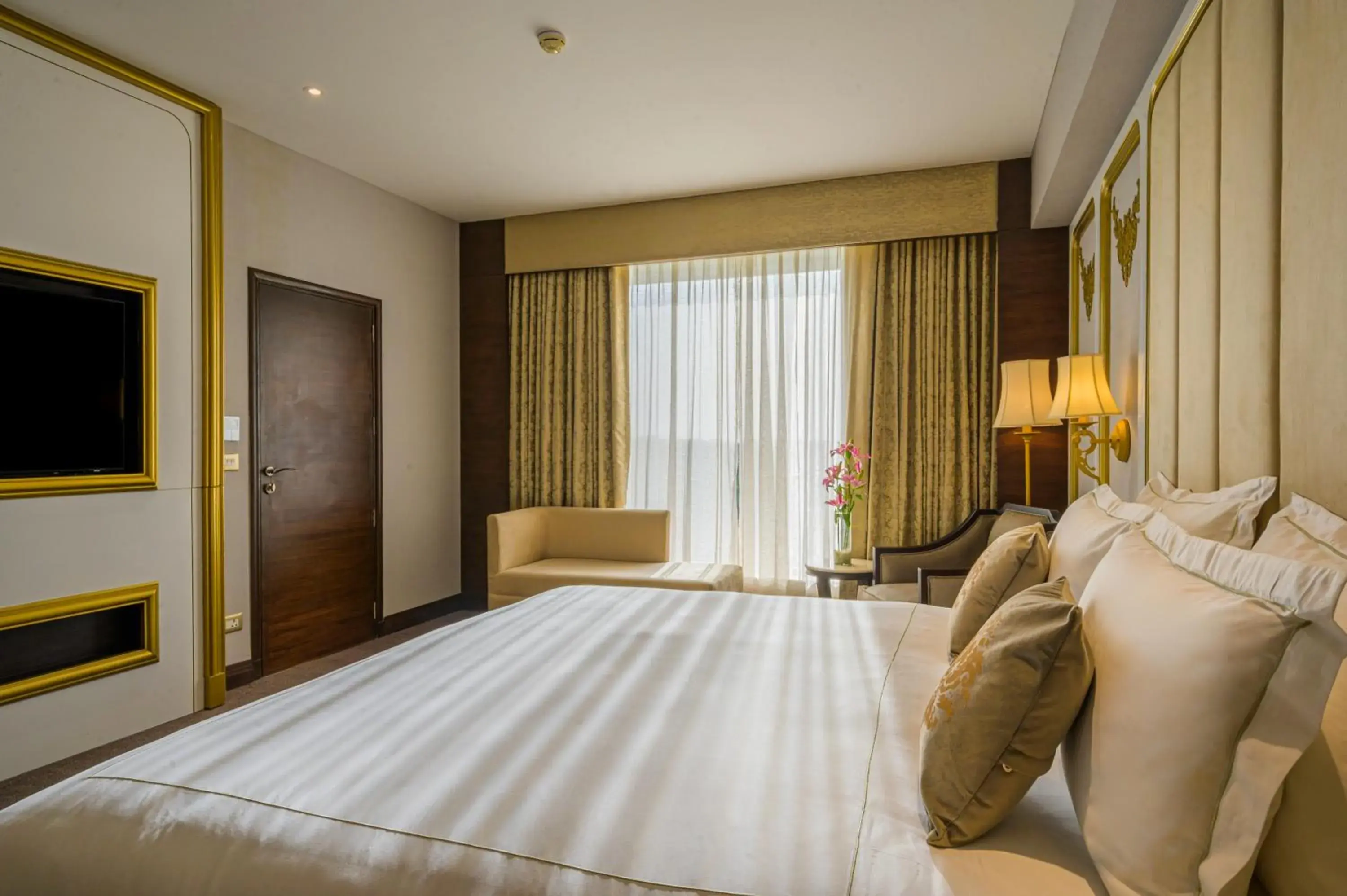 Bed in Taj Gandhinagar Resort and Spa Bed in Taj Gandhinagar Resort and Spa
