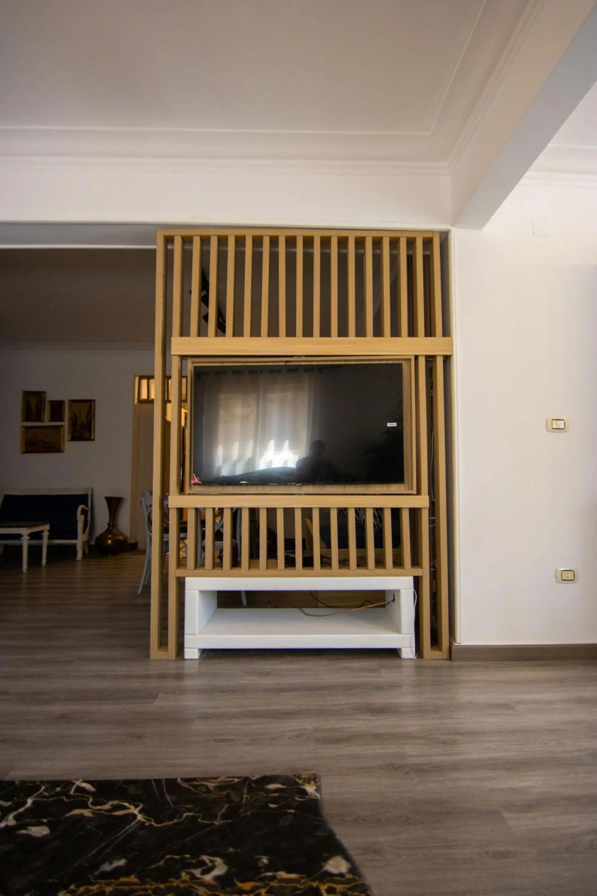 TV and multimedia in Lovely 3BR Apartment in Heart of Mohandseen