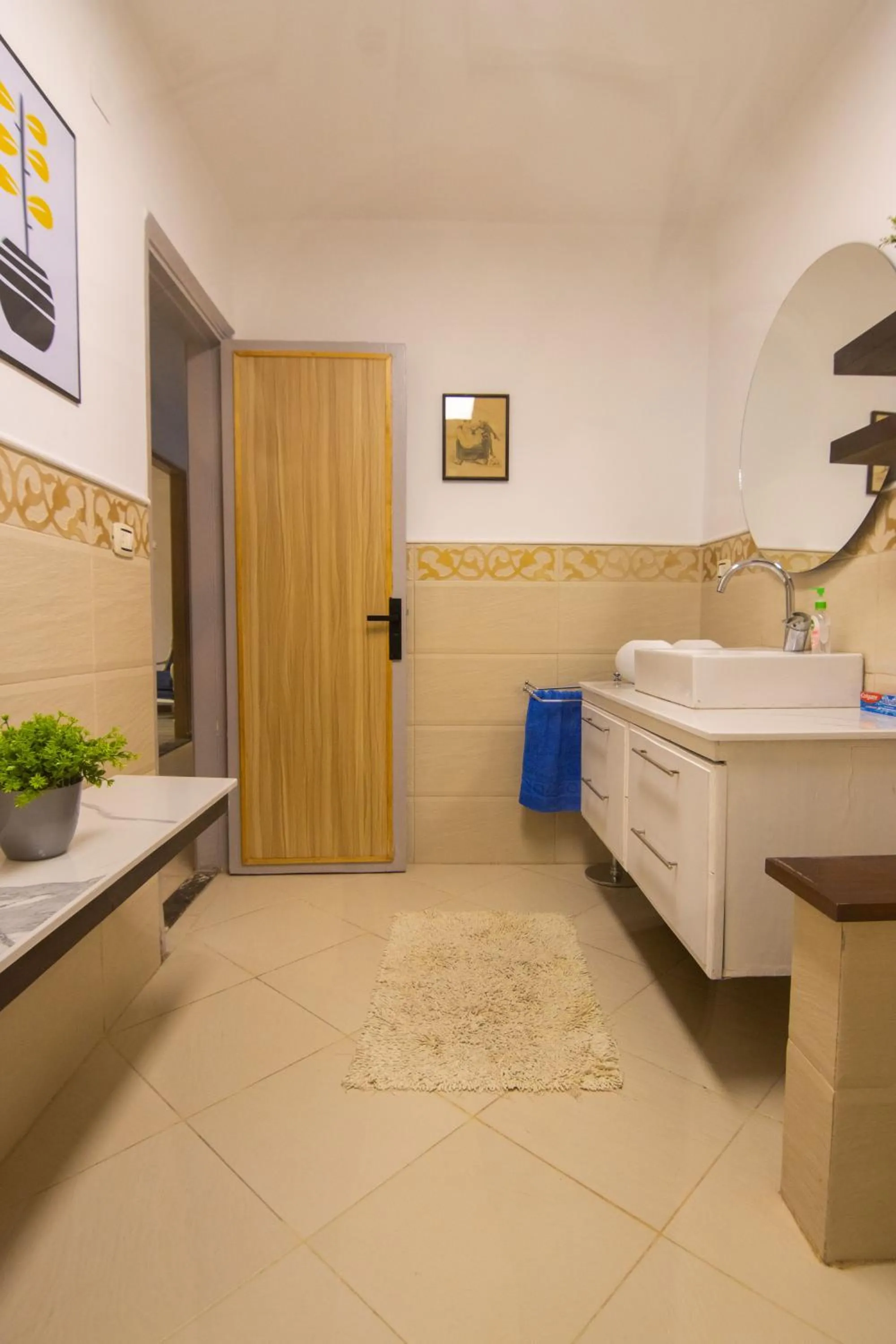 Toilet in Lovely 3BR Apartment in Heart of Mohandseen