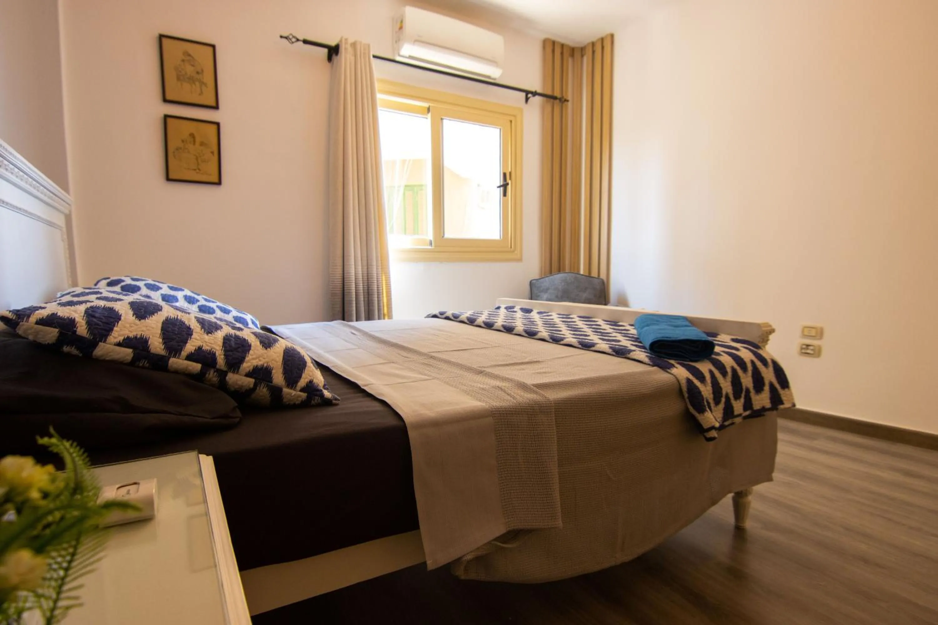 Bed in Lovely 3BR Apartment in Heart of Mohandseen