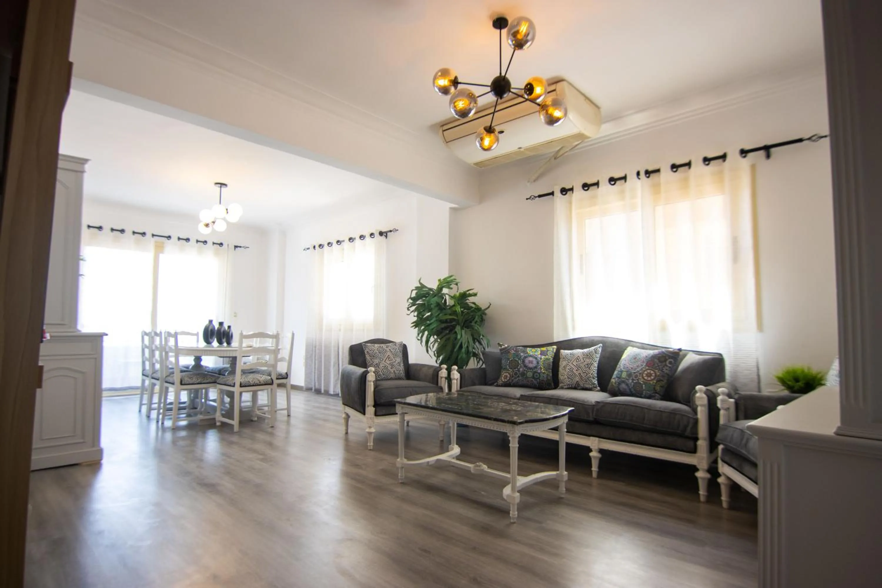 Living room in Lovely 3BR Apartment in Heart of Mohandseen