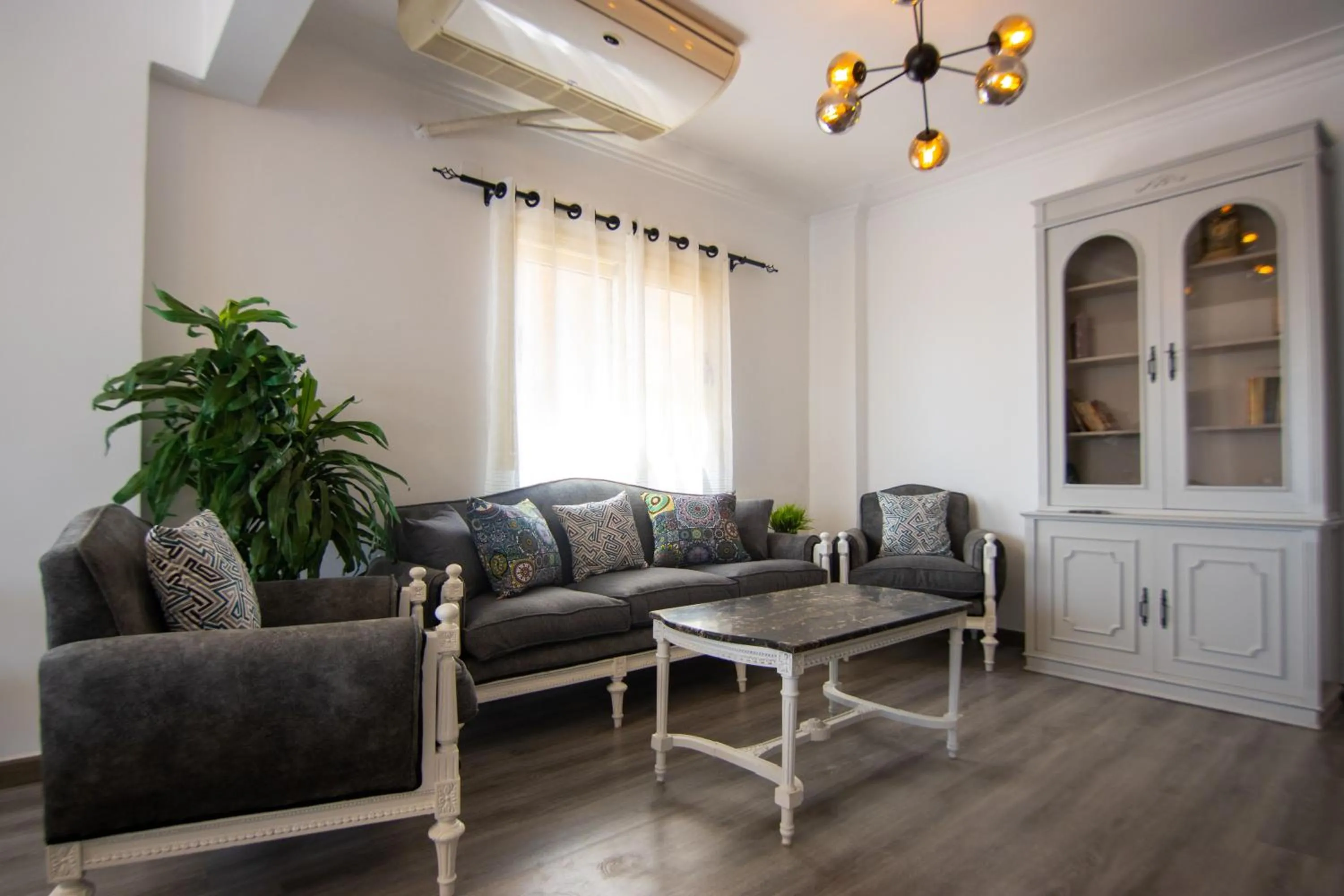 Living room in Lovely 3BR Apartment in Heart of Mohandseen
