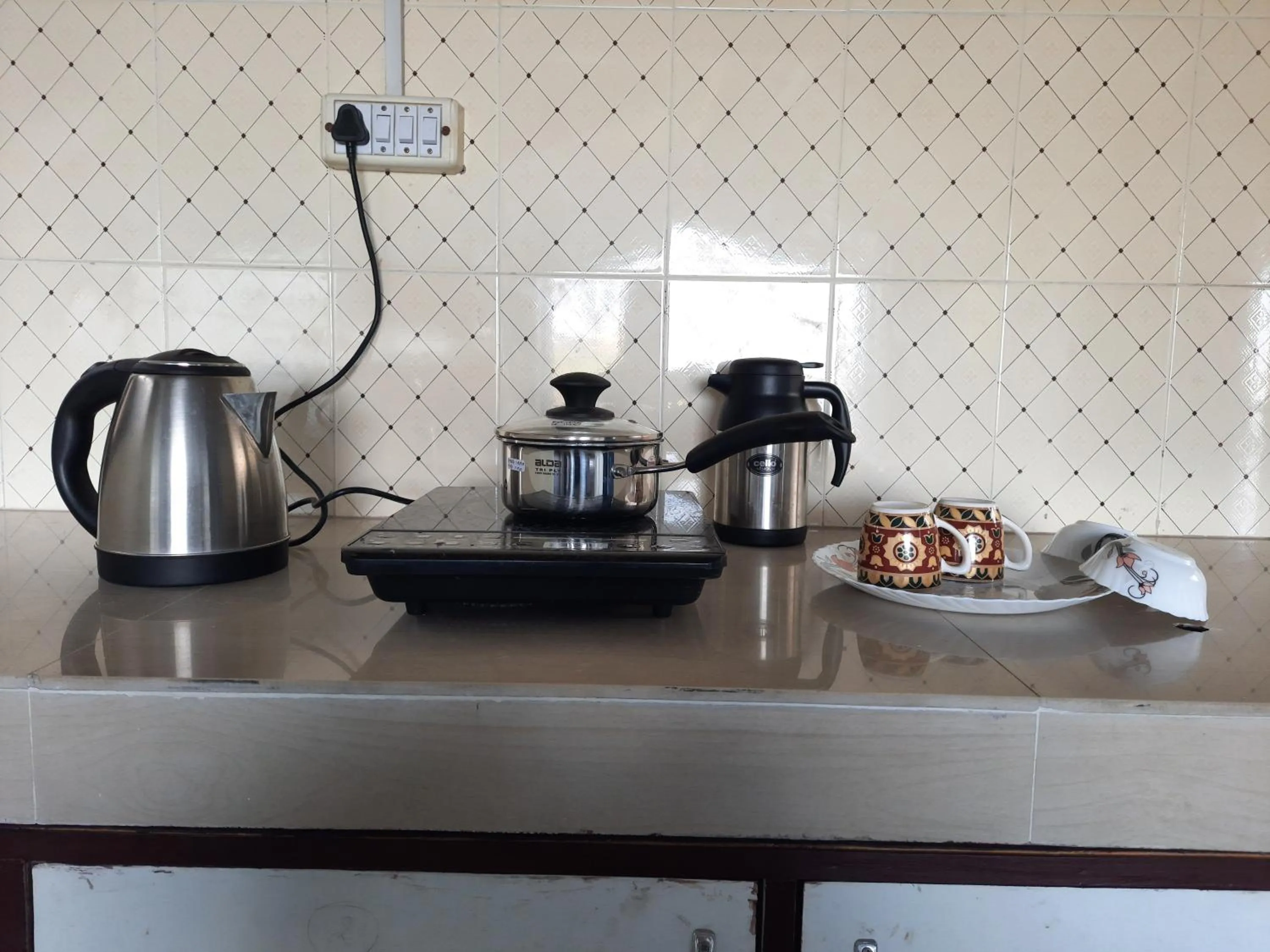 Kitchen or kitchenette in Om Niwas Homestay