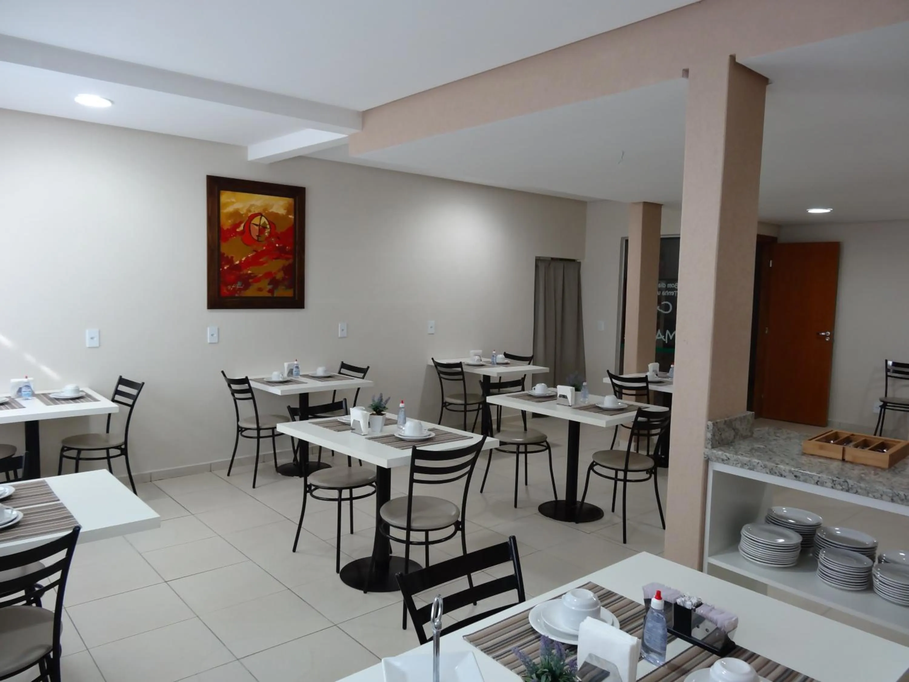 Dining area in Cerrado Hotel LTDA