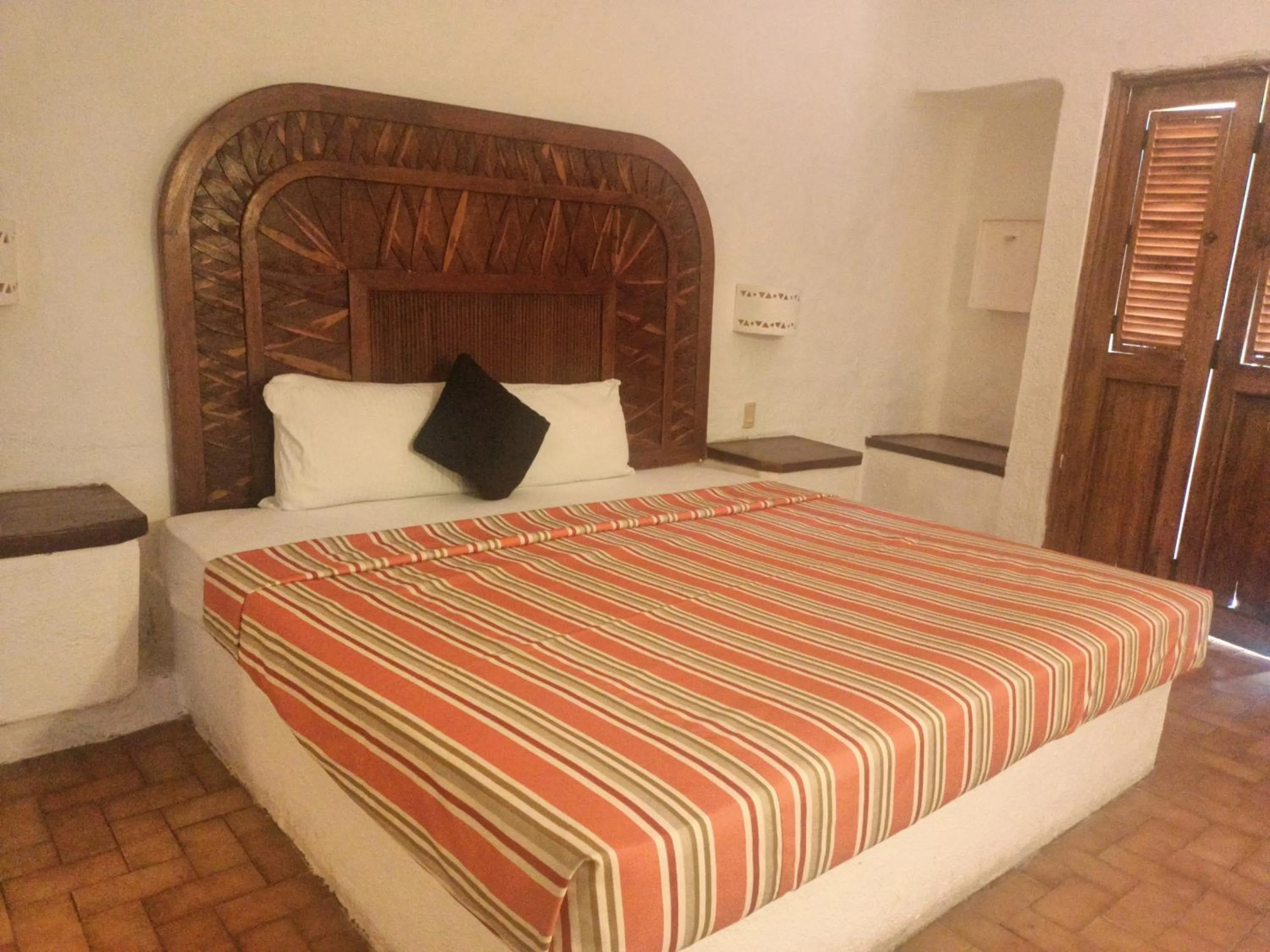 Bed in hotel plaza tucanes