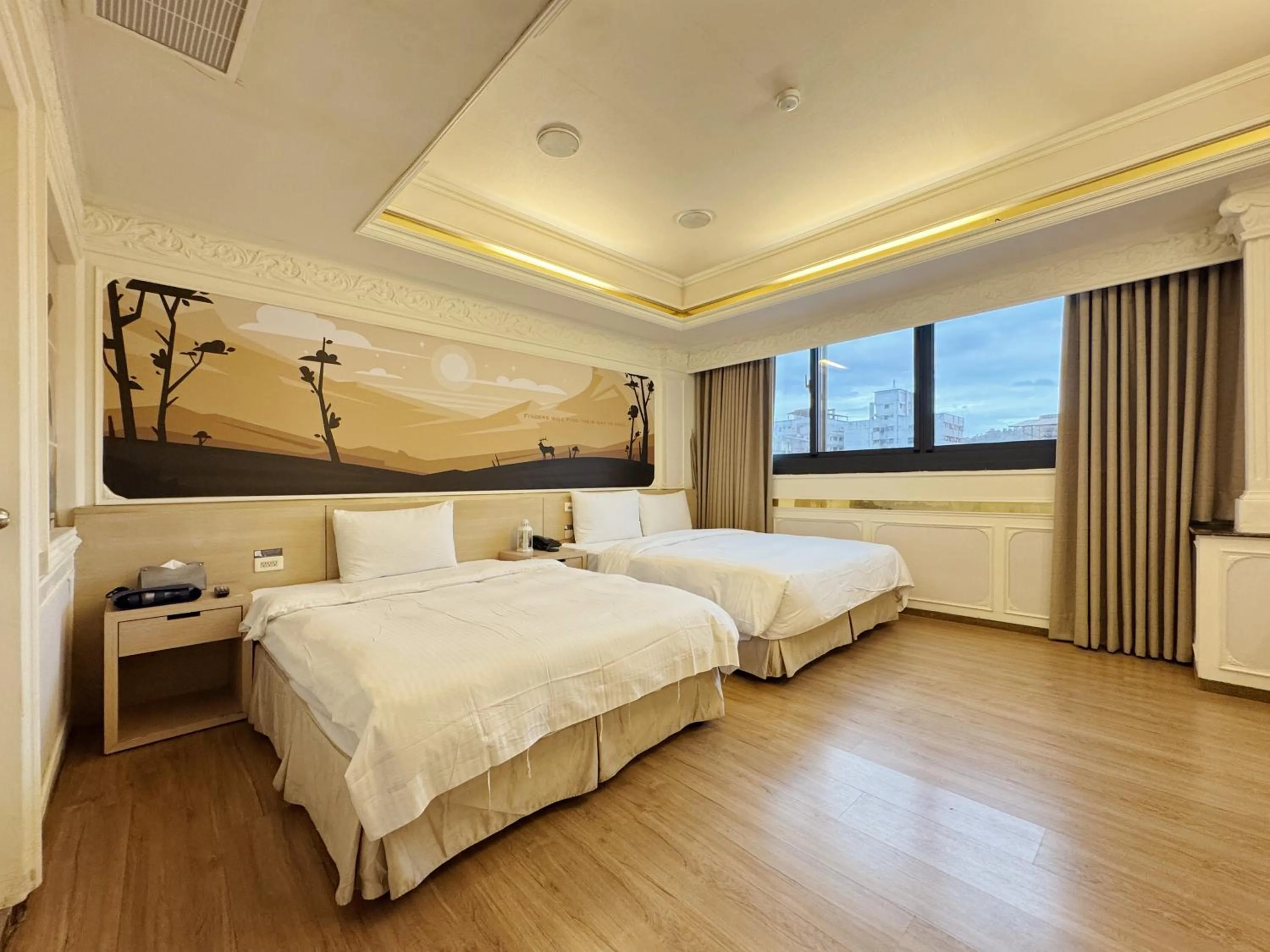 Photo of the whole room, Bed in Finders Hotel Hualien Station