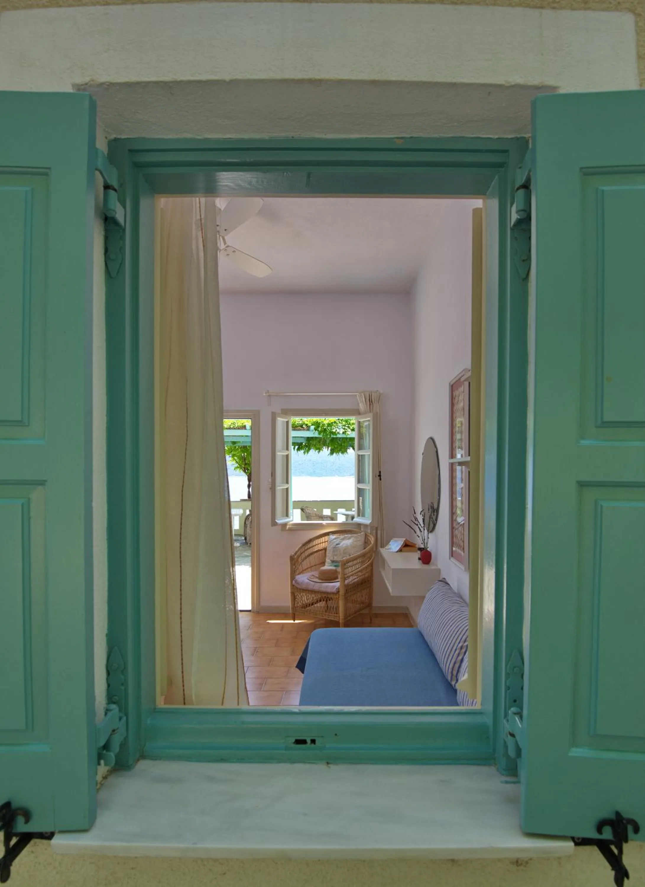 Seating area, Bed in Casa Kalypso