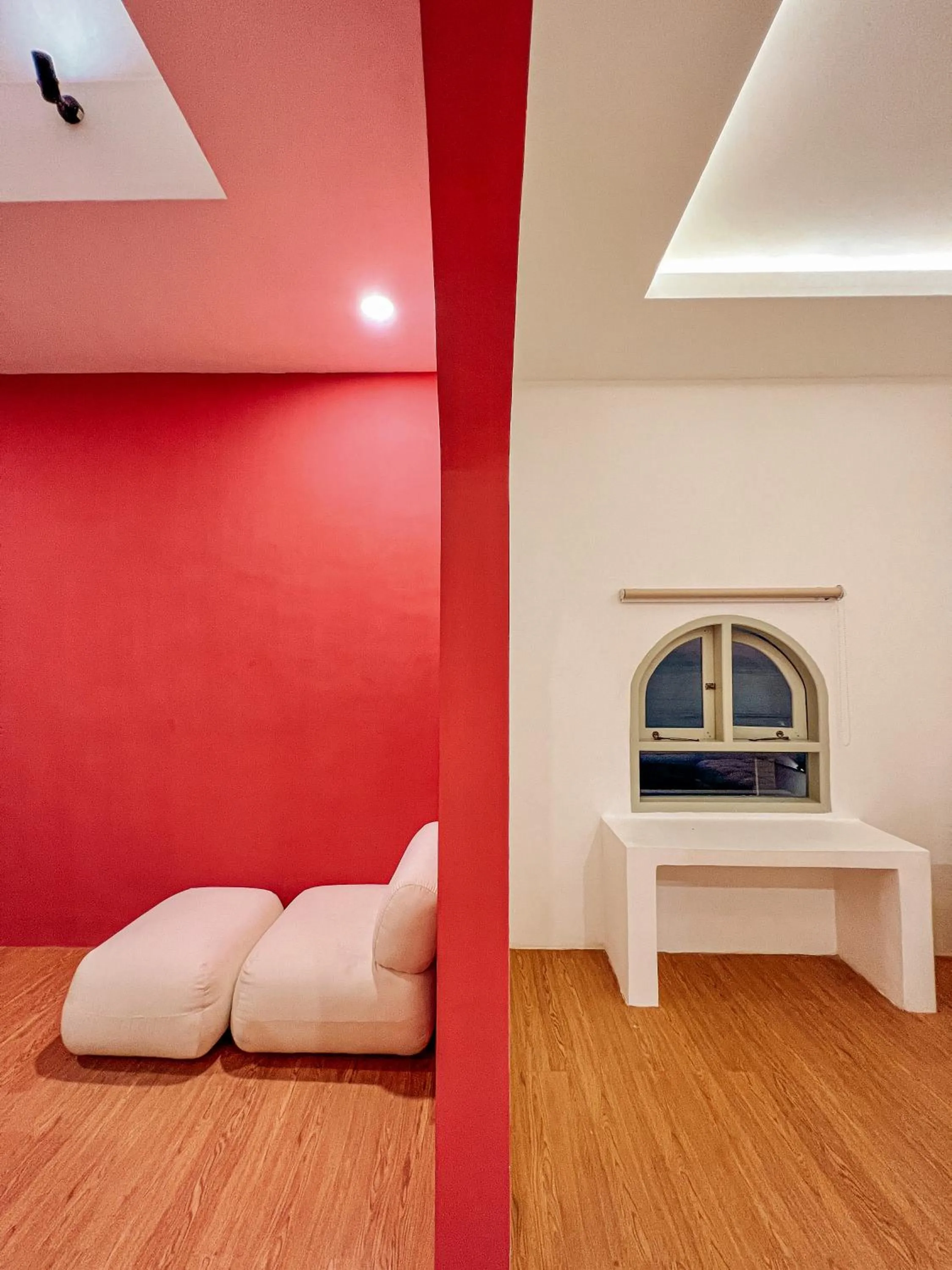 Seating area, Bed in Renjana Beach House