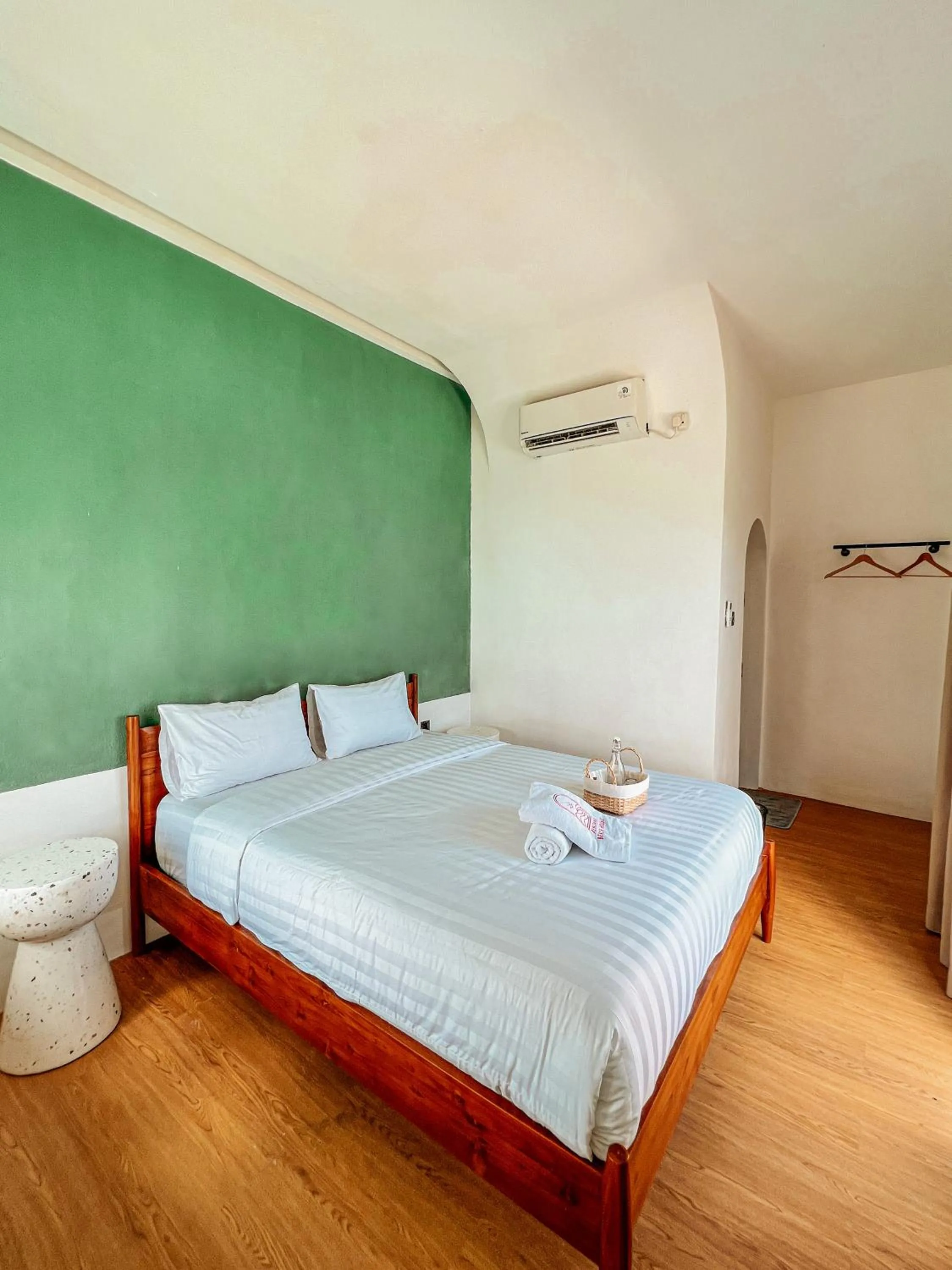 Bed in Renjana Beach House