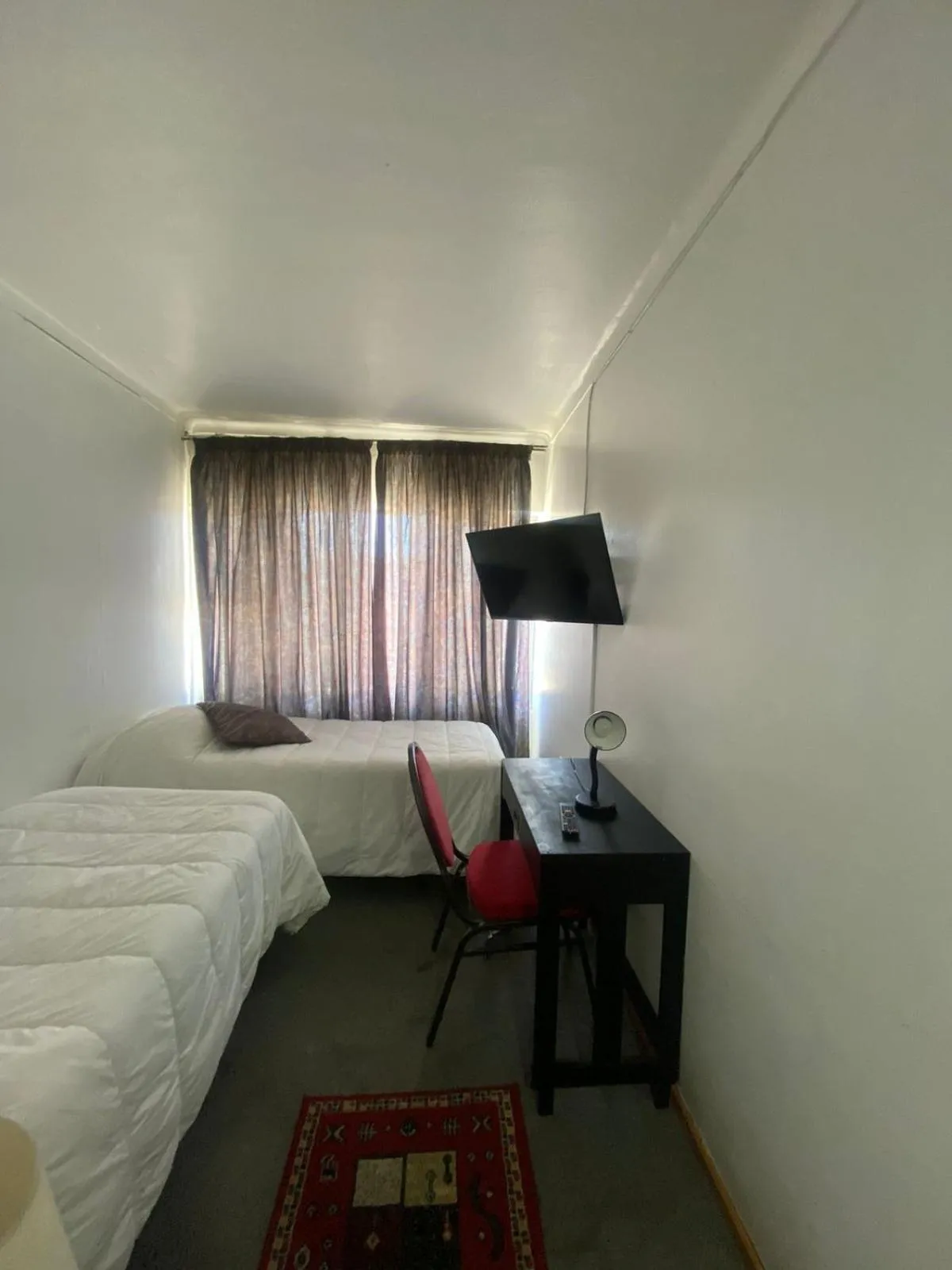 Bed in NEW HOTEL CRUZ DEL SUR