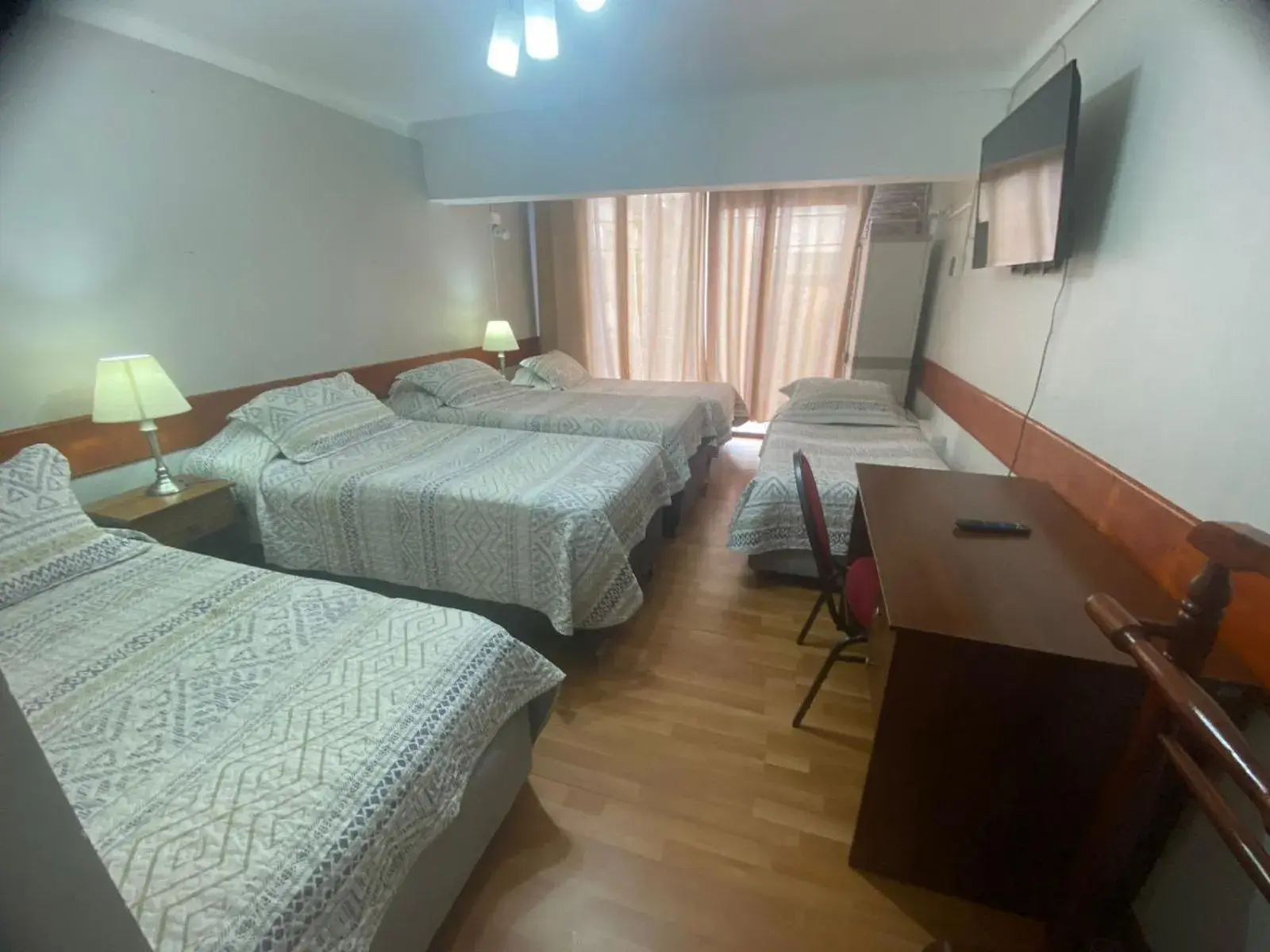 Deluxe Quadruple Room - single occupancy in NEW HOTEL CRUZ DEL SUR Deluxe Quadruple Room - single occupancy in NEW HOTEL CRUZ DEL SUR