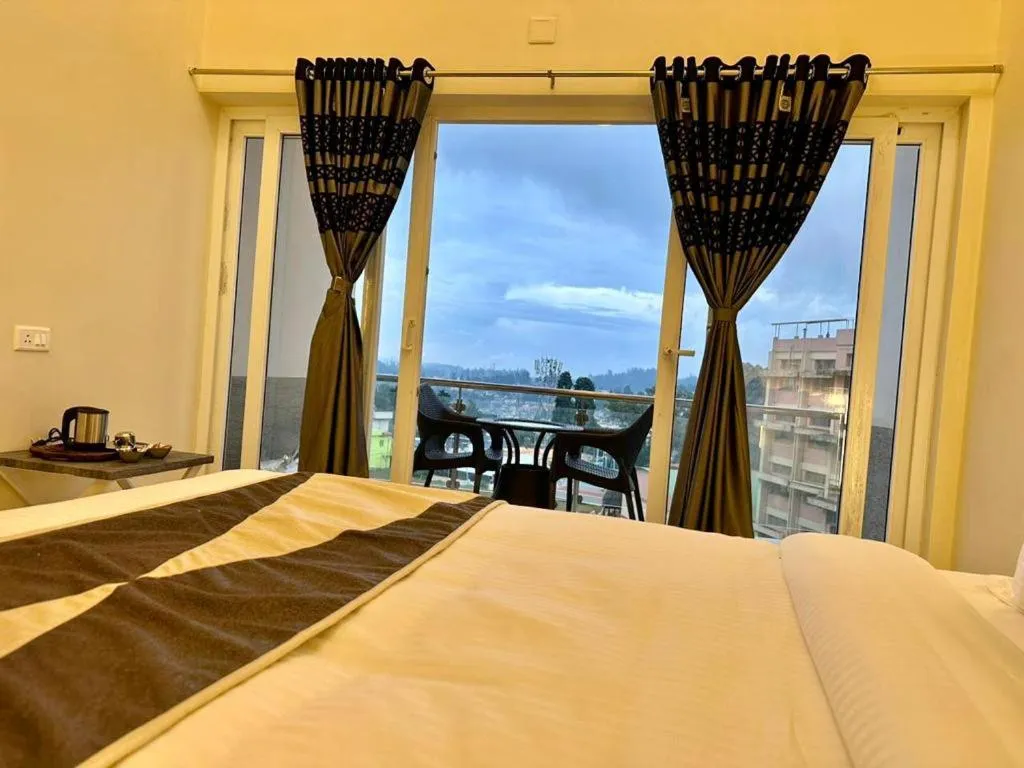 Bed in Ponmari Villa