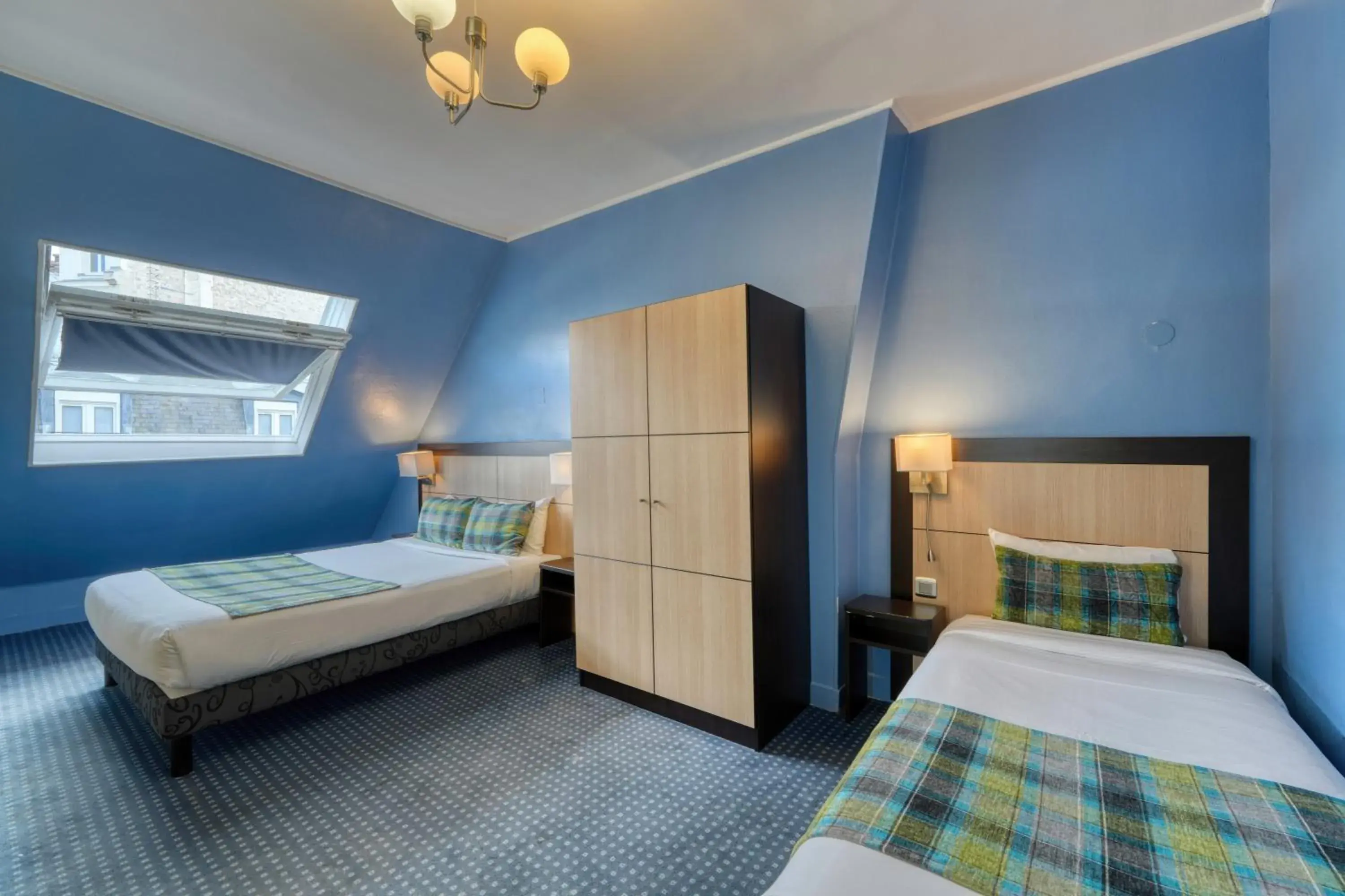 Bed in Hotel Phenix Paris Bed in Hotel Phenix Paris