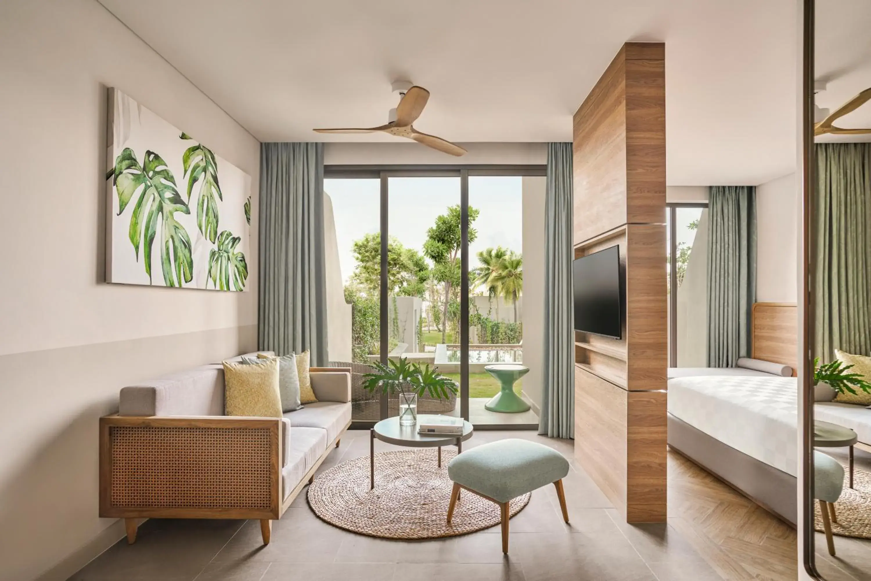 Communal lounge/ TV room, Bed in IXORA Ho Tram By Fusion Communal lounge/ TV room, Bed in IXORA Ho Tram By Fusion