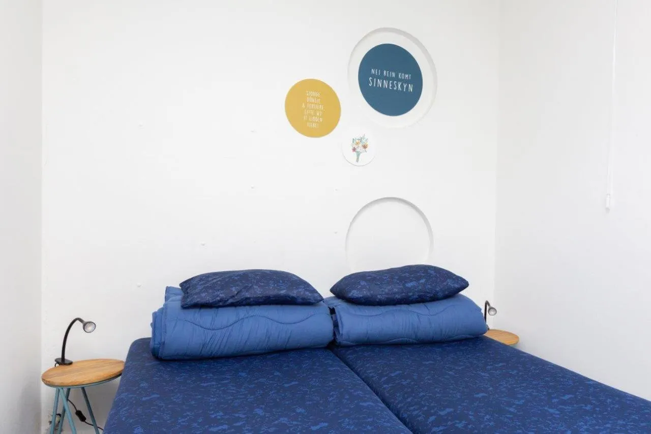 Bed in Het Toppunt groot vakantiehuis aan het water