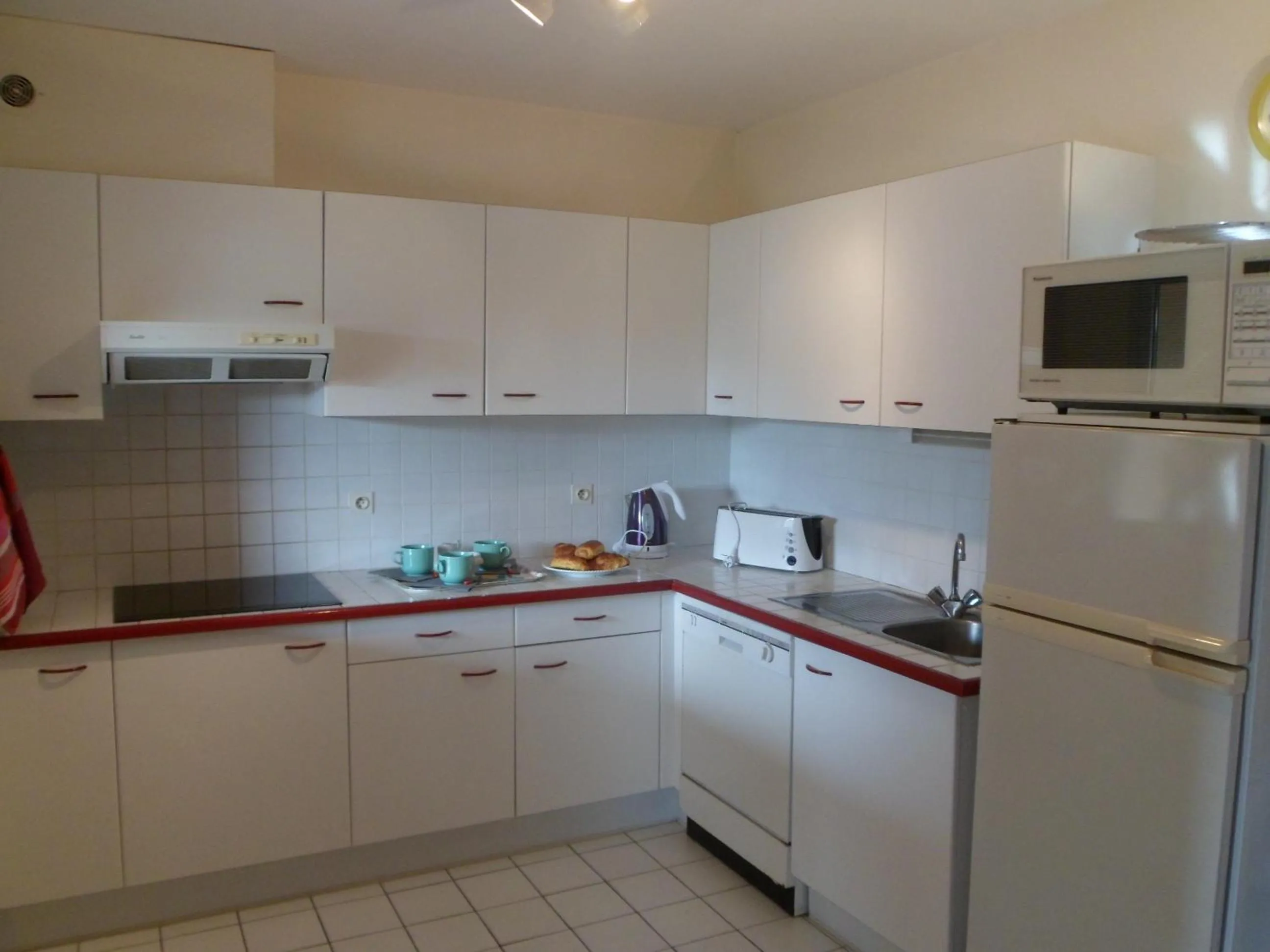 Kitchen or kitchenette in Résidence d'Aquitaine