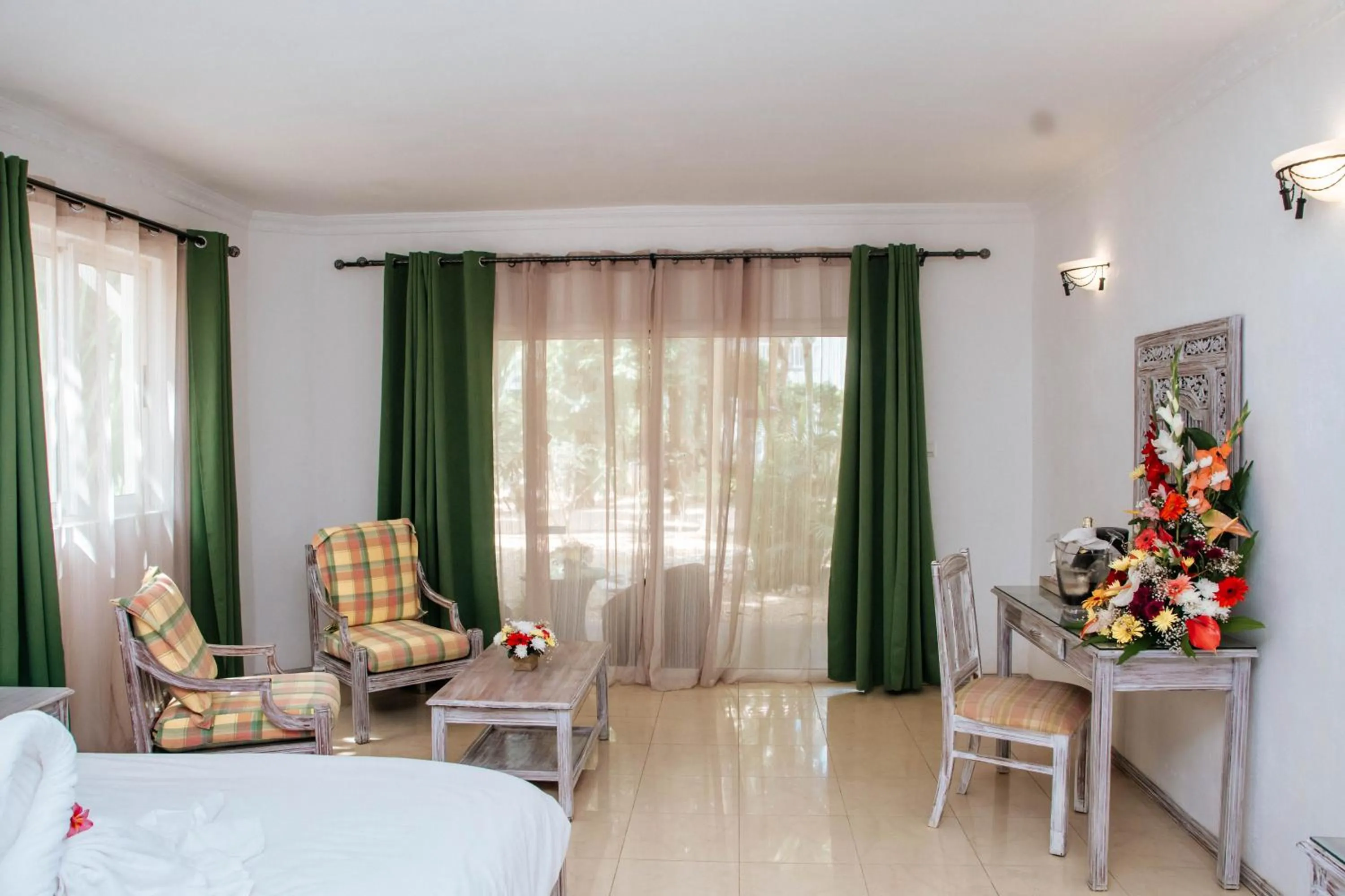 Bed in Hibiscus Boutique Hotel