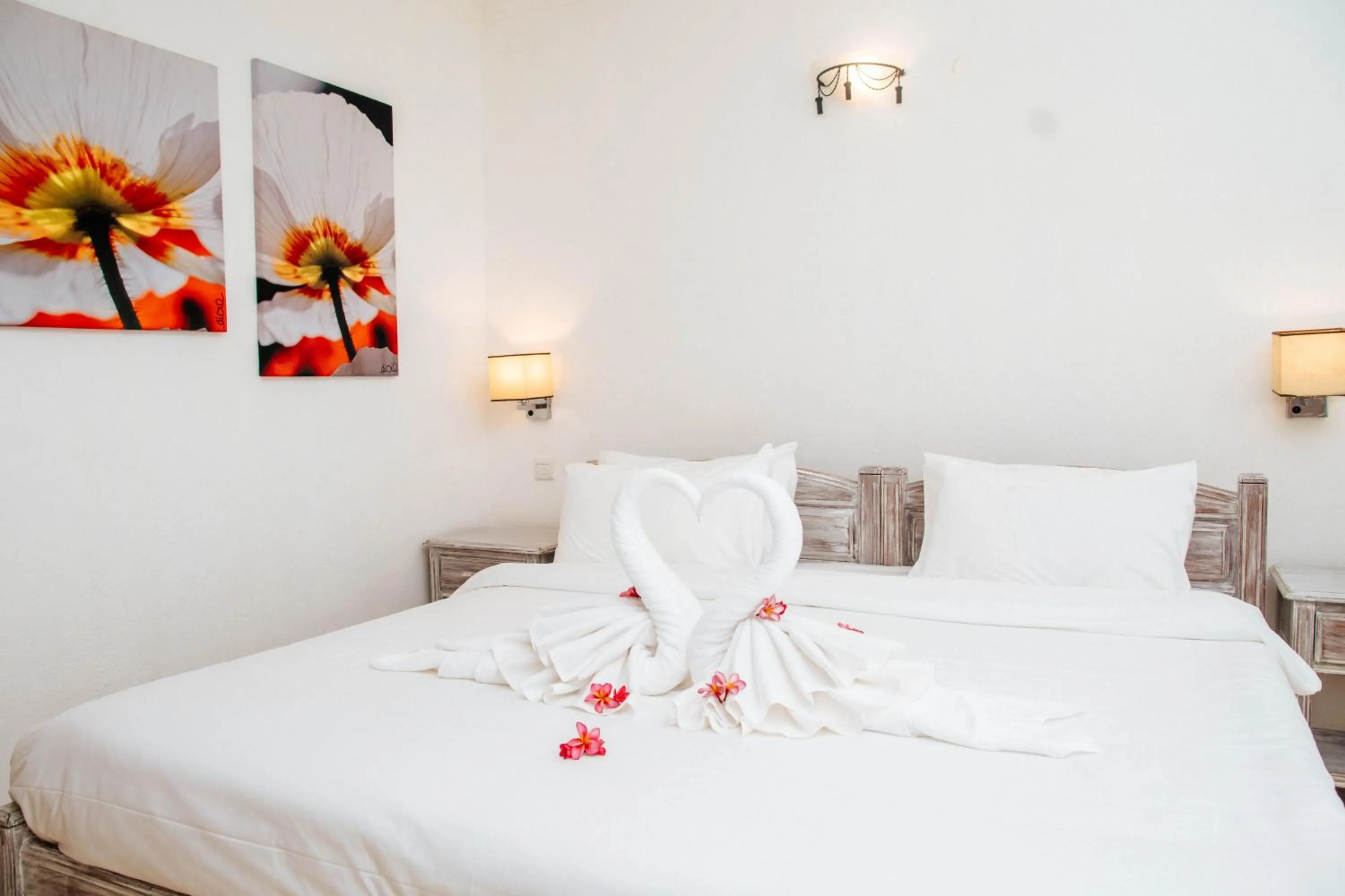 Bed in Hibiscus Boutique Hotel