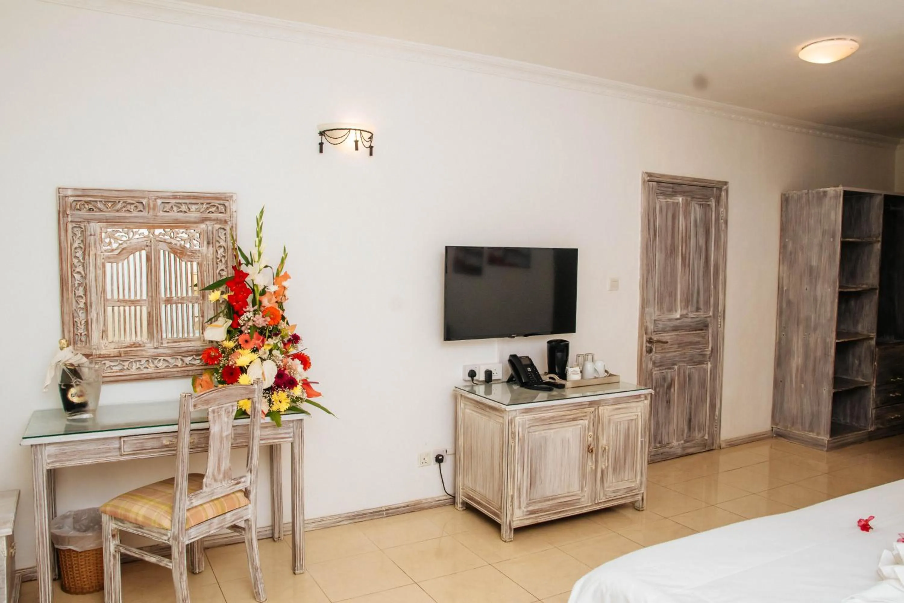 Bed in Hibiscus Boutique Hotel