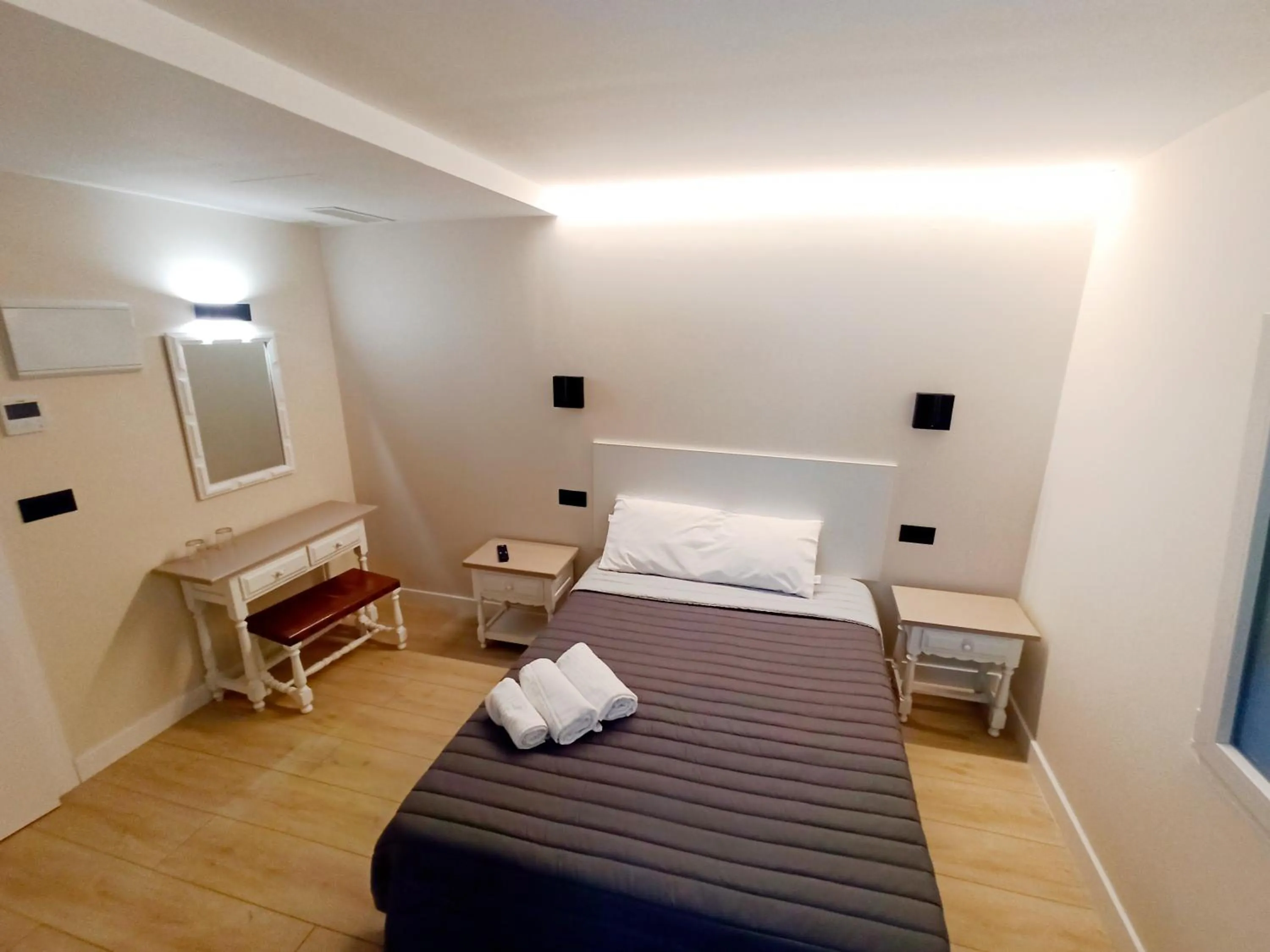 Bed in Bahia Rooms Cantabria 3000