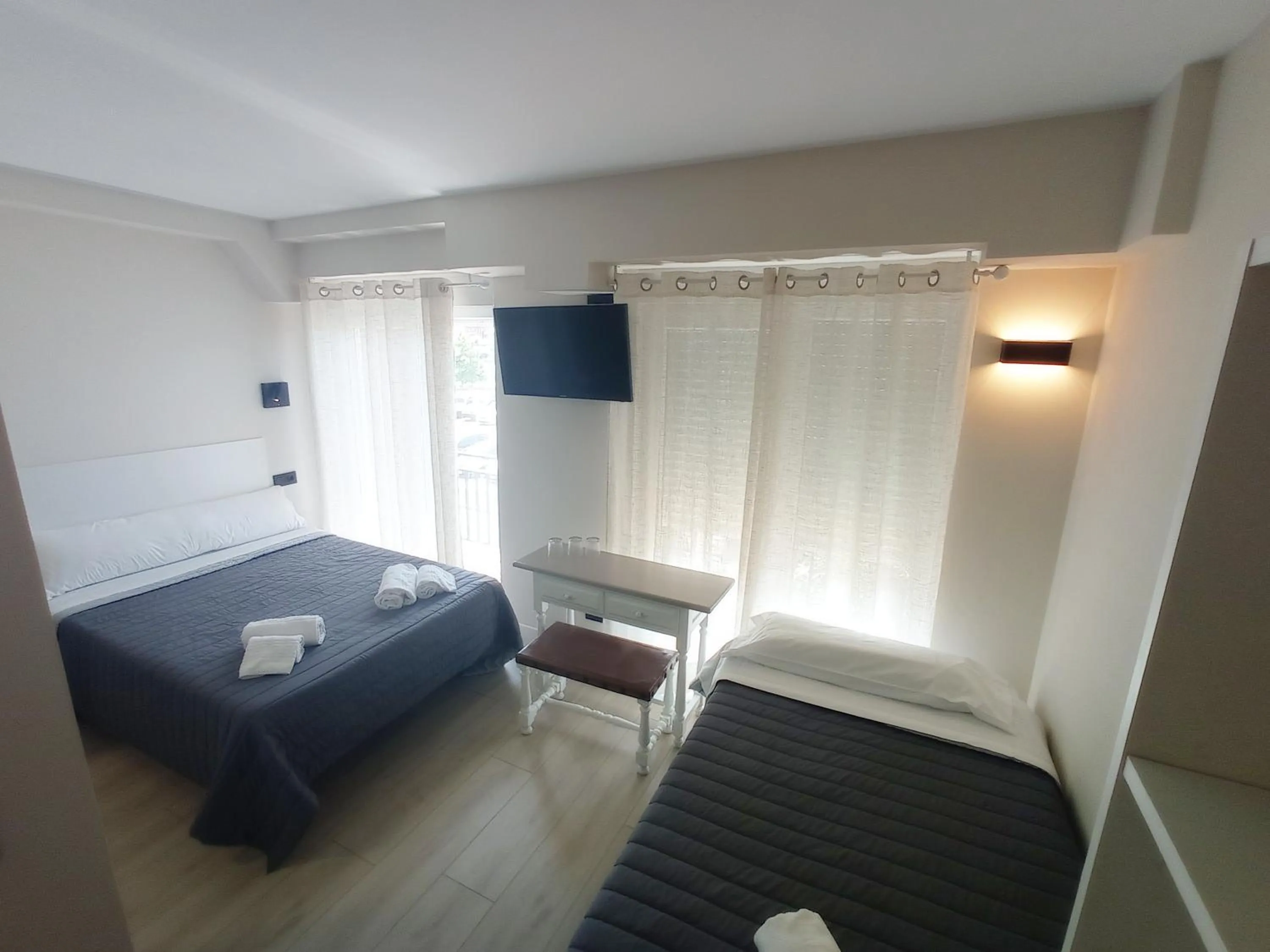 Bed in Bahia Rooms Cantabria 3000