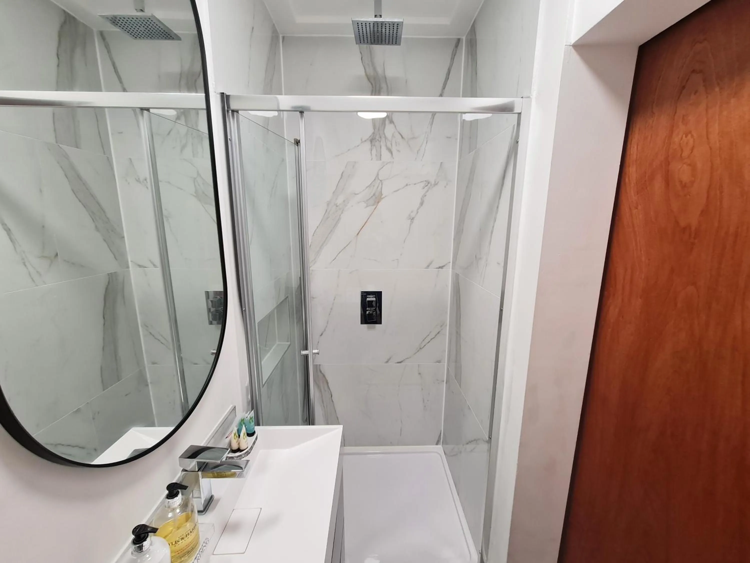 Shower in Stylish Suites with kitchenette