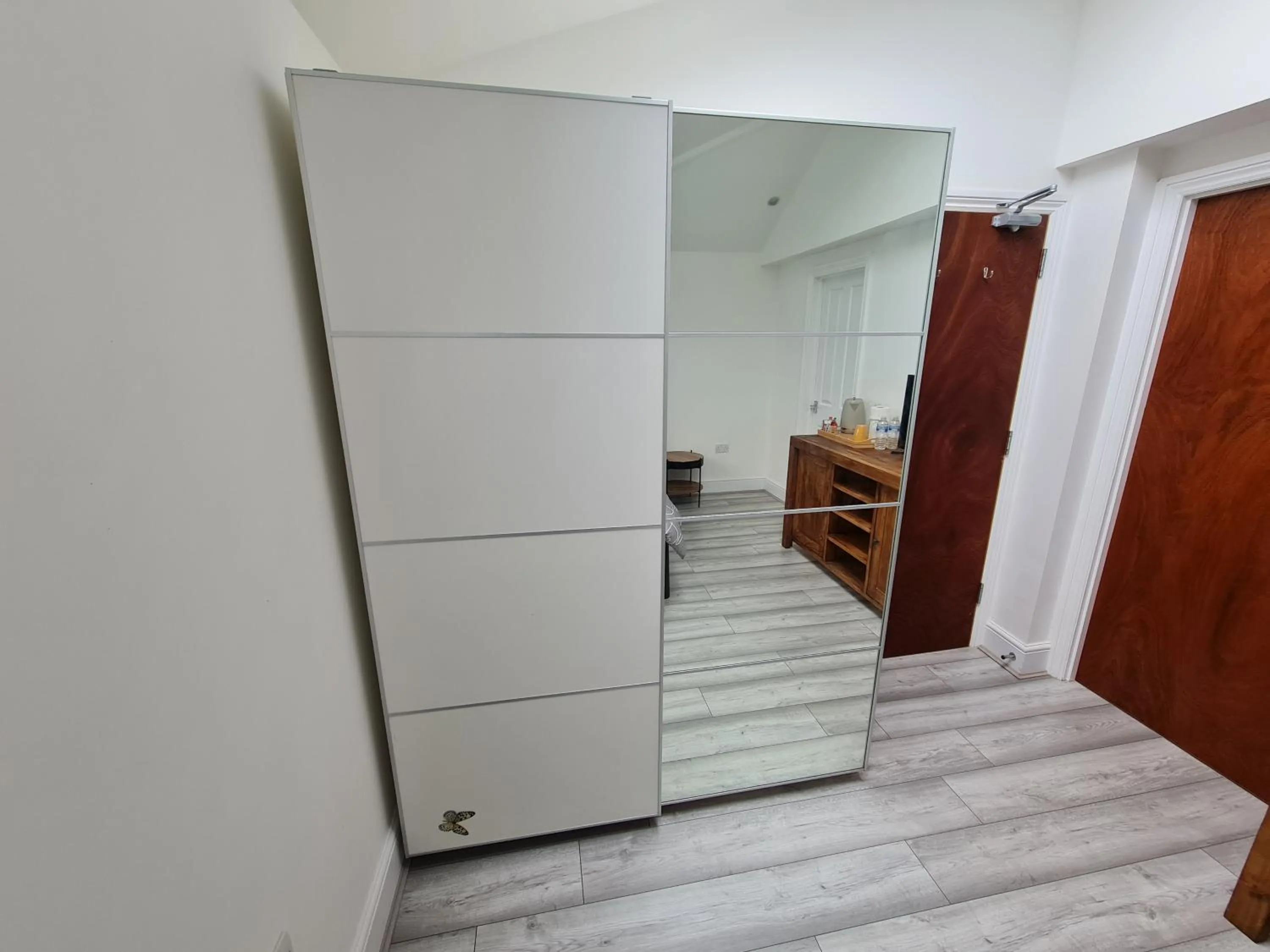 wardrobe in Stylish Suites with kitchenette