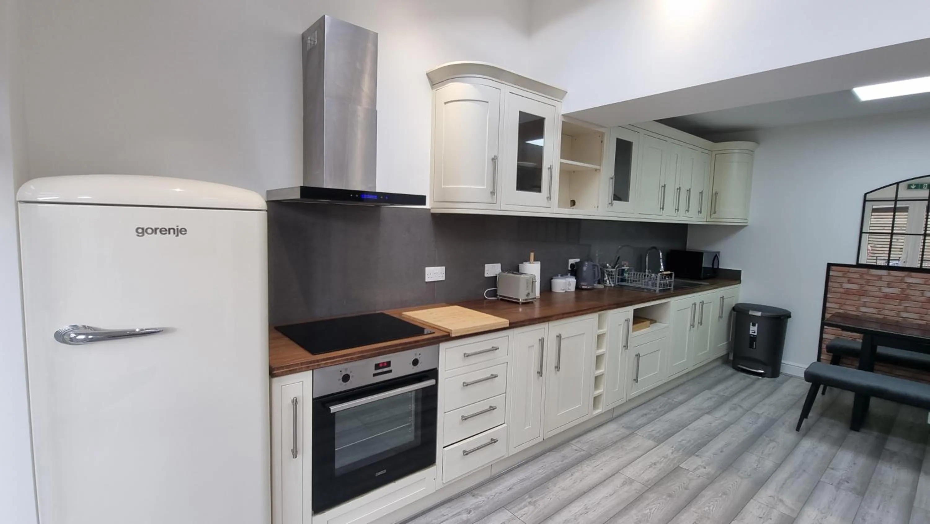 Kitchen or kitchenette in Stylish Suites with kitchenette