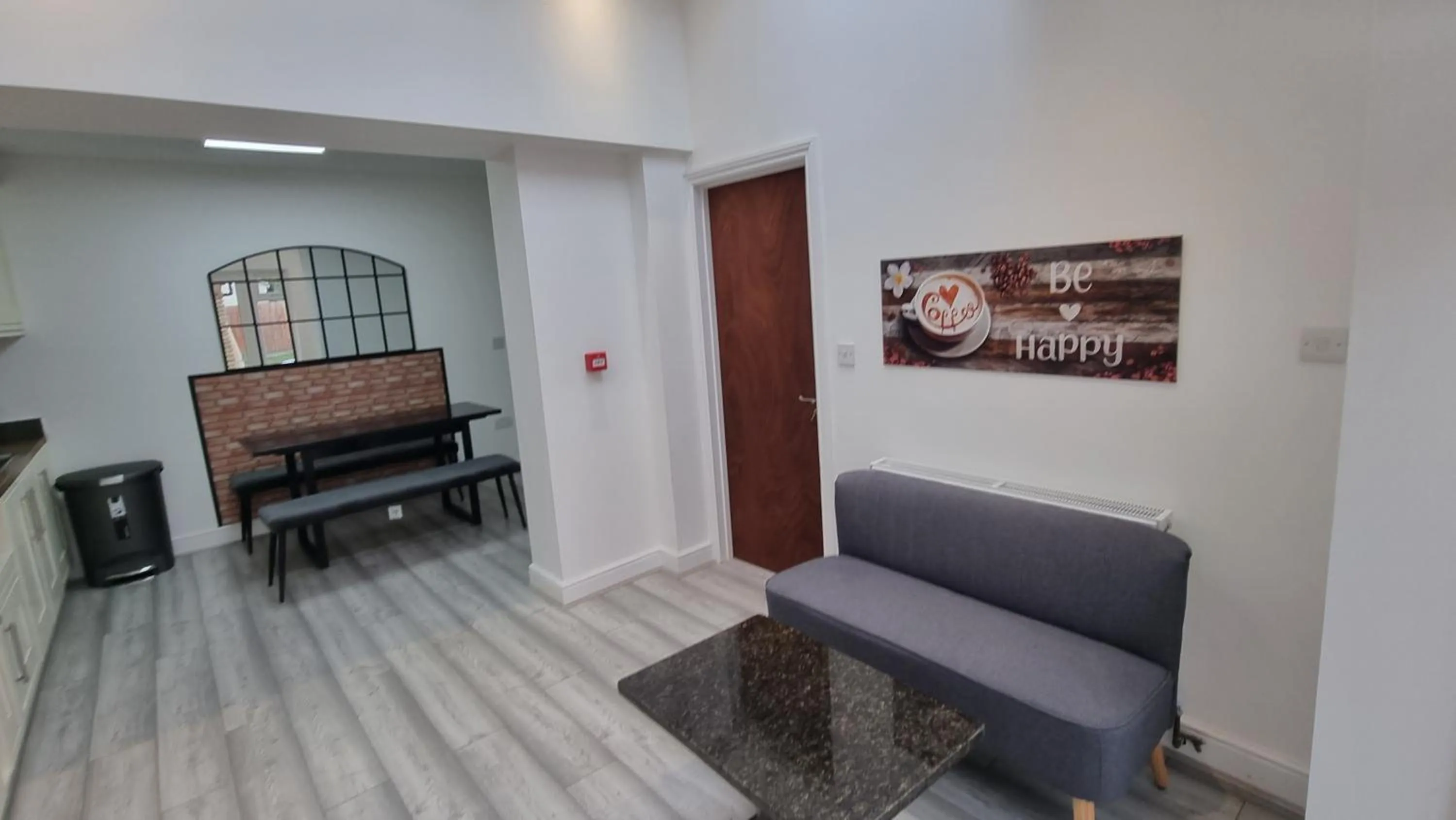 Living room in Stylish Suites with kitchenette