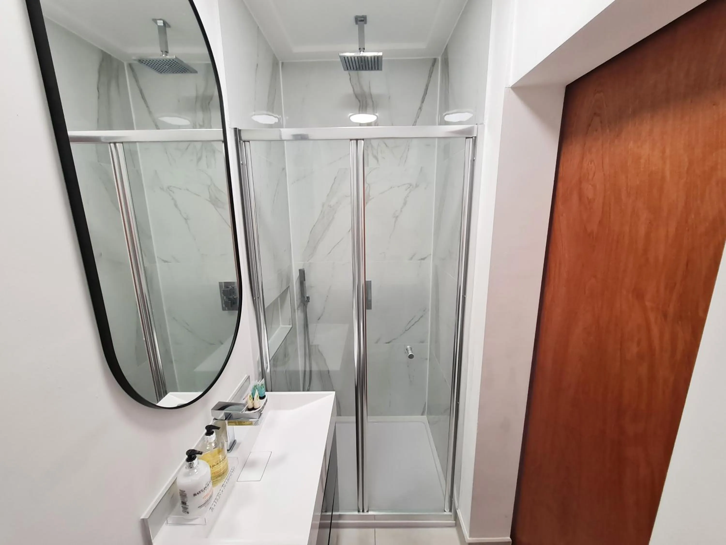 Shower in Stylish Suites with kitchenette