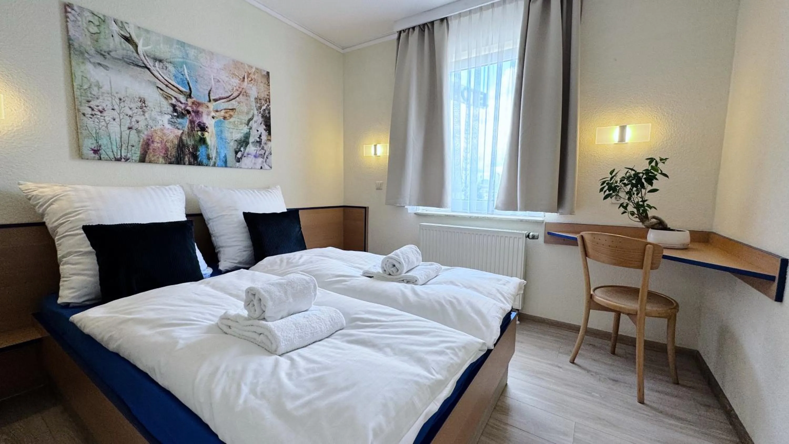 Photo of the whole room, Bed in REGIOHOTEL Salzland Schönebeck