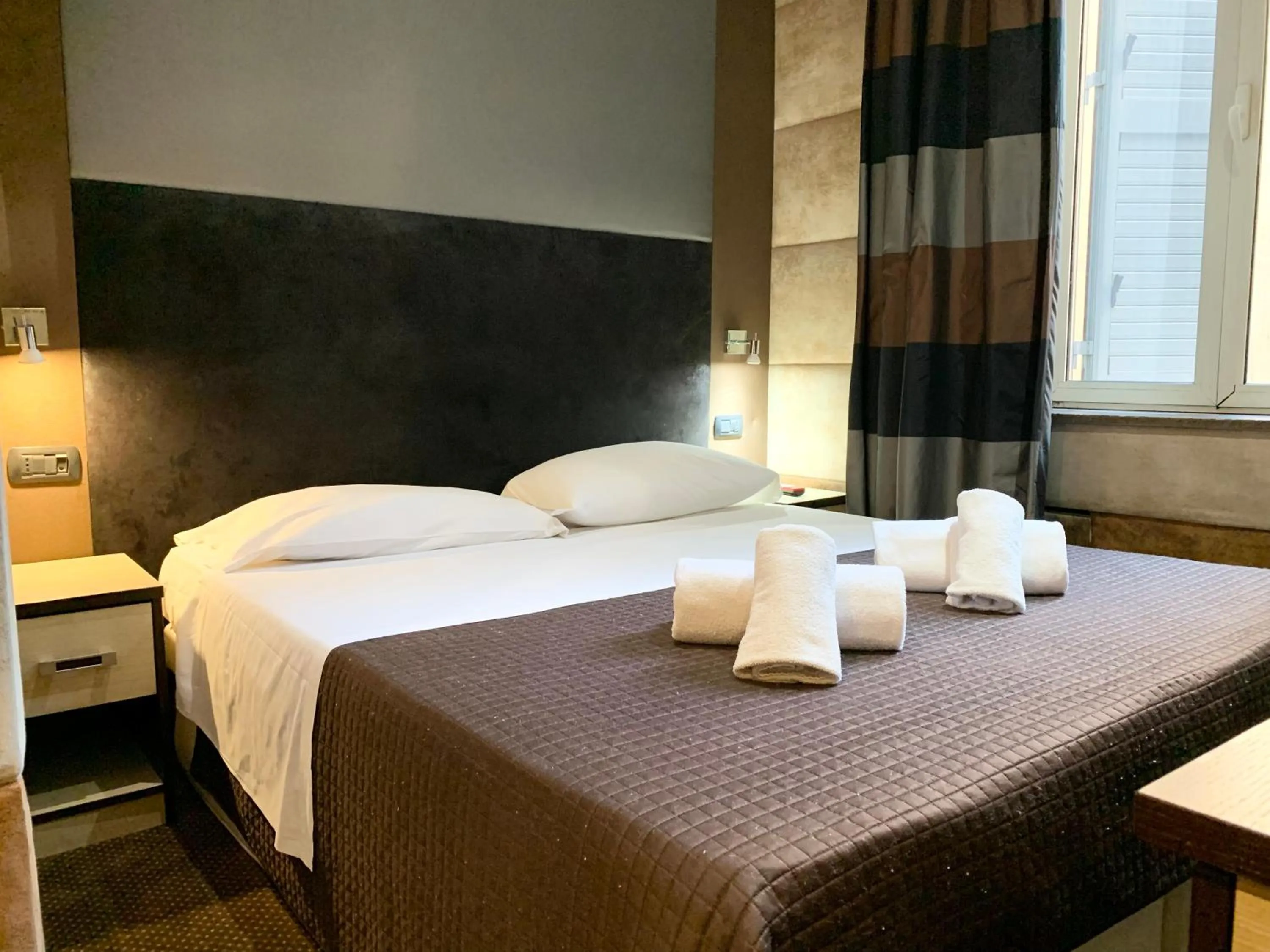 Bed in Blue Suite Vatican Guesthouse