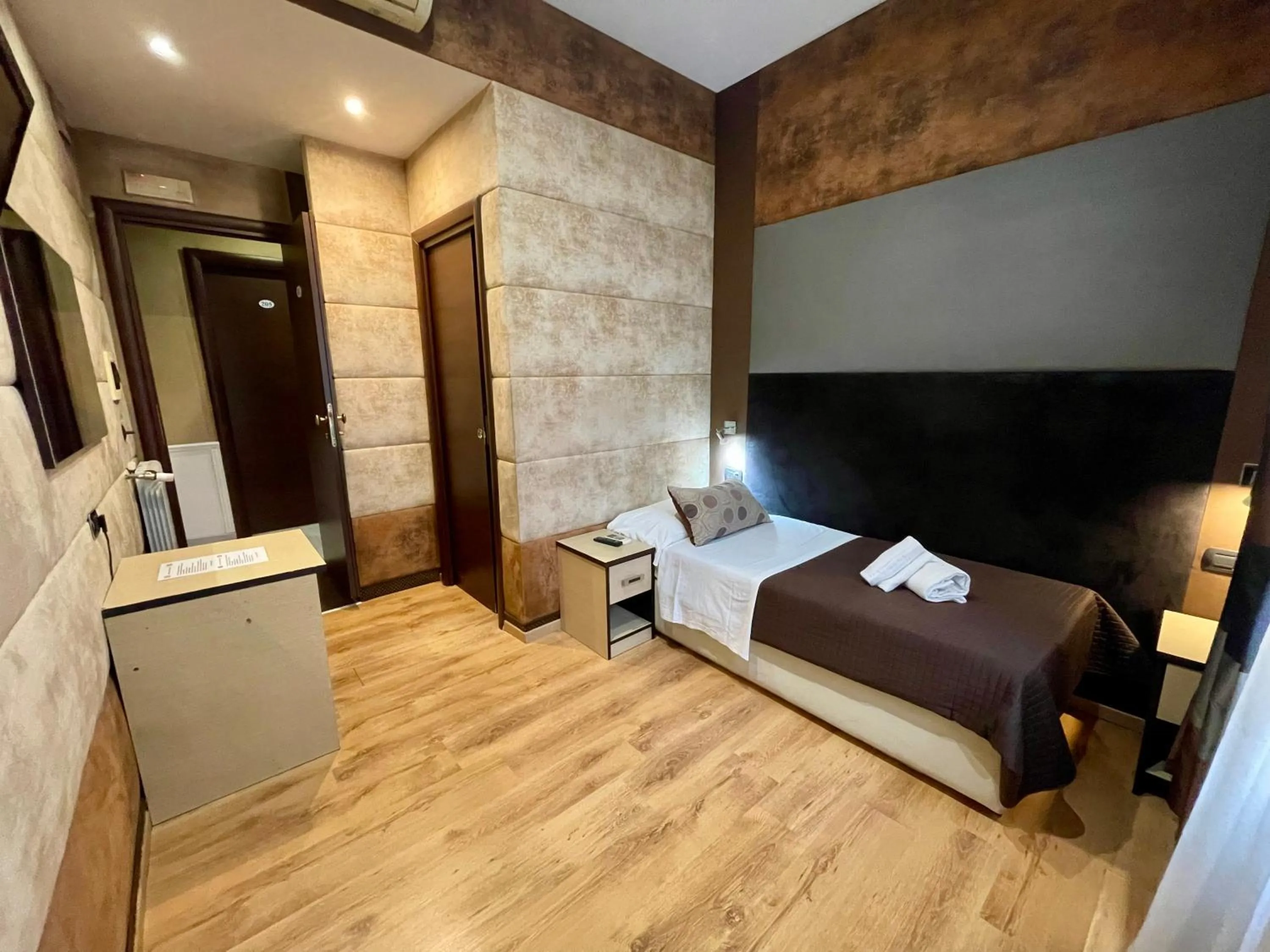 Bed in Blue Suite Vatican Guesthouse