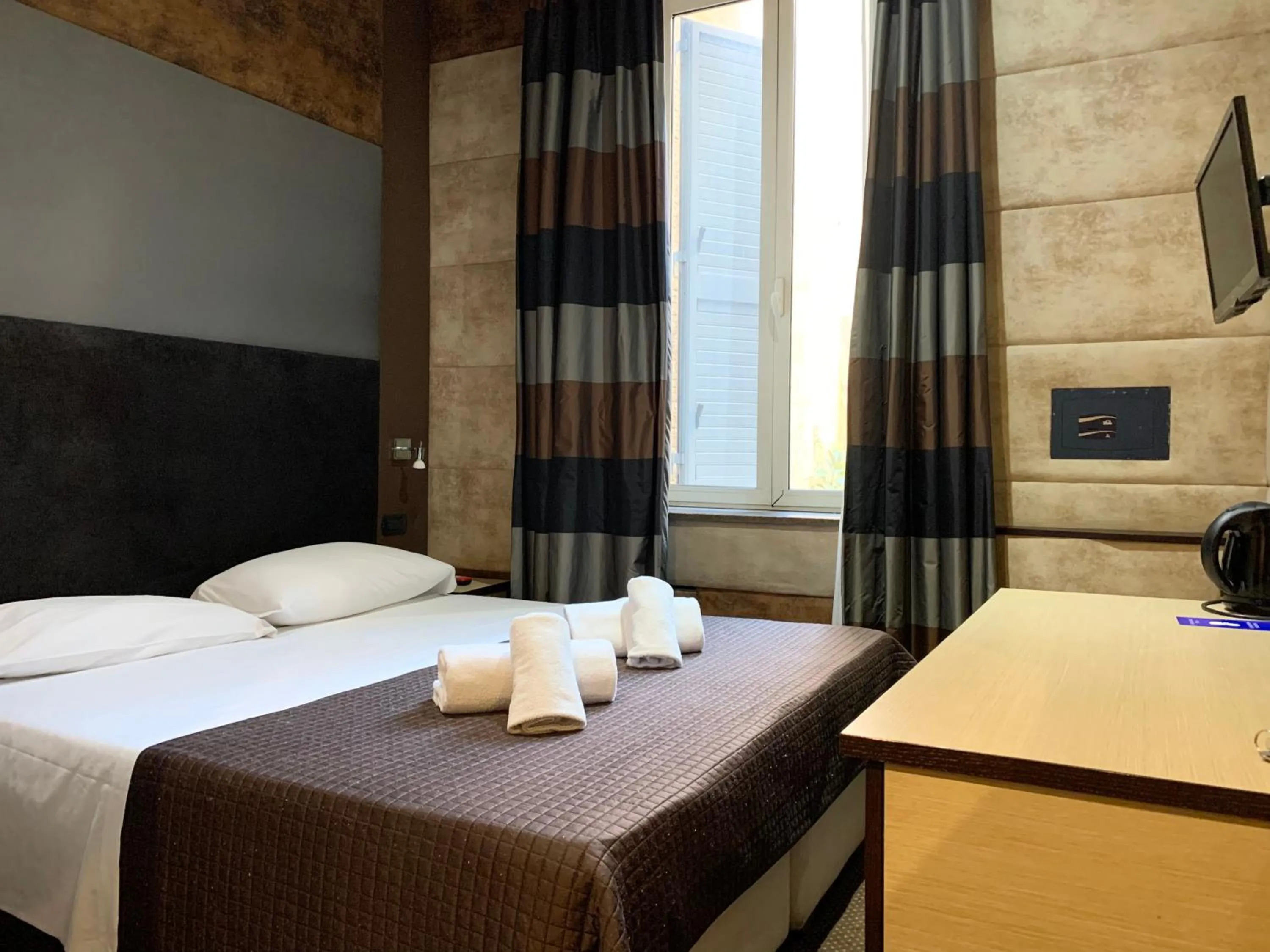 Bed in Blue Suite Vatican Guesthouse