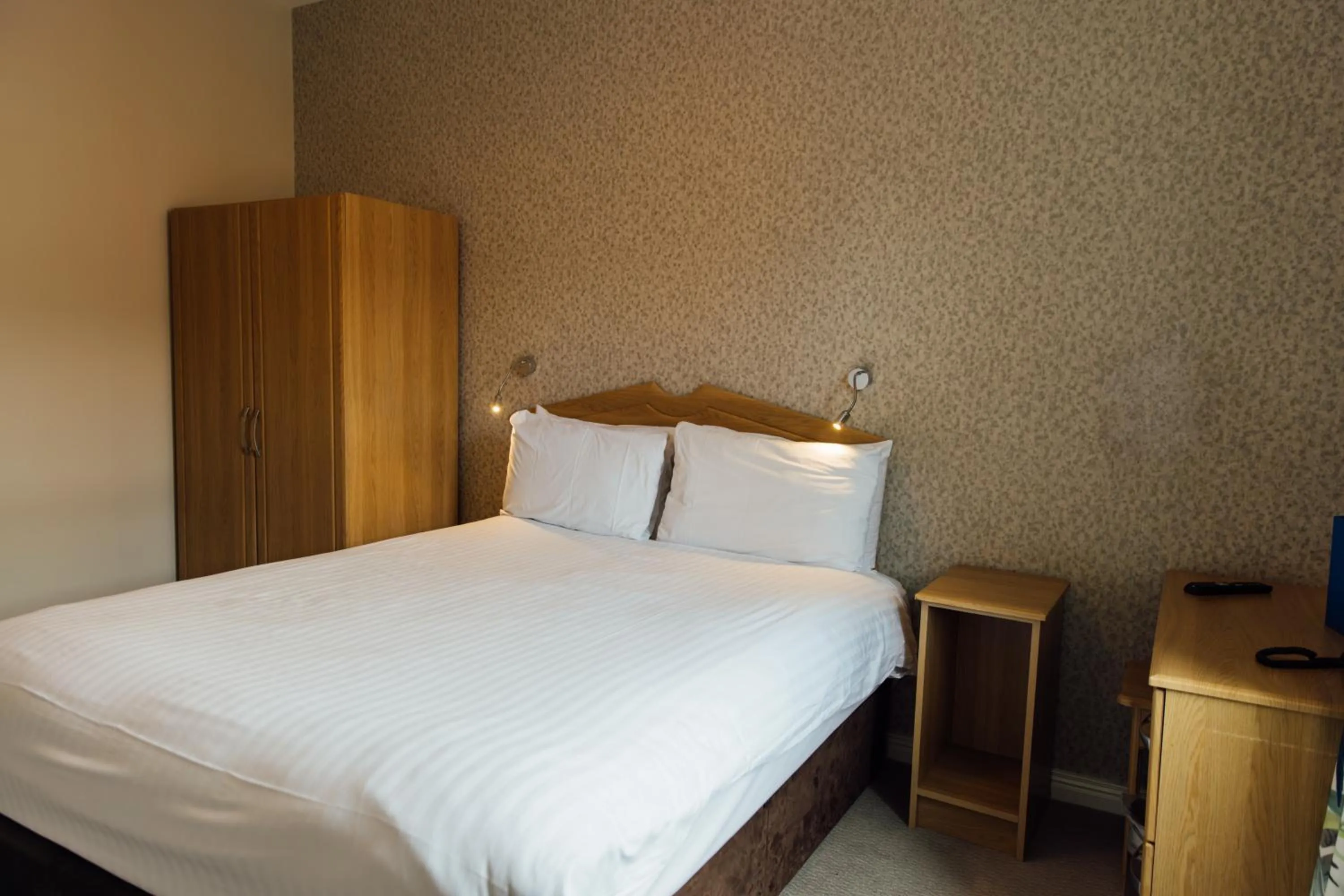 Bed in The Malone Hotel