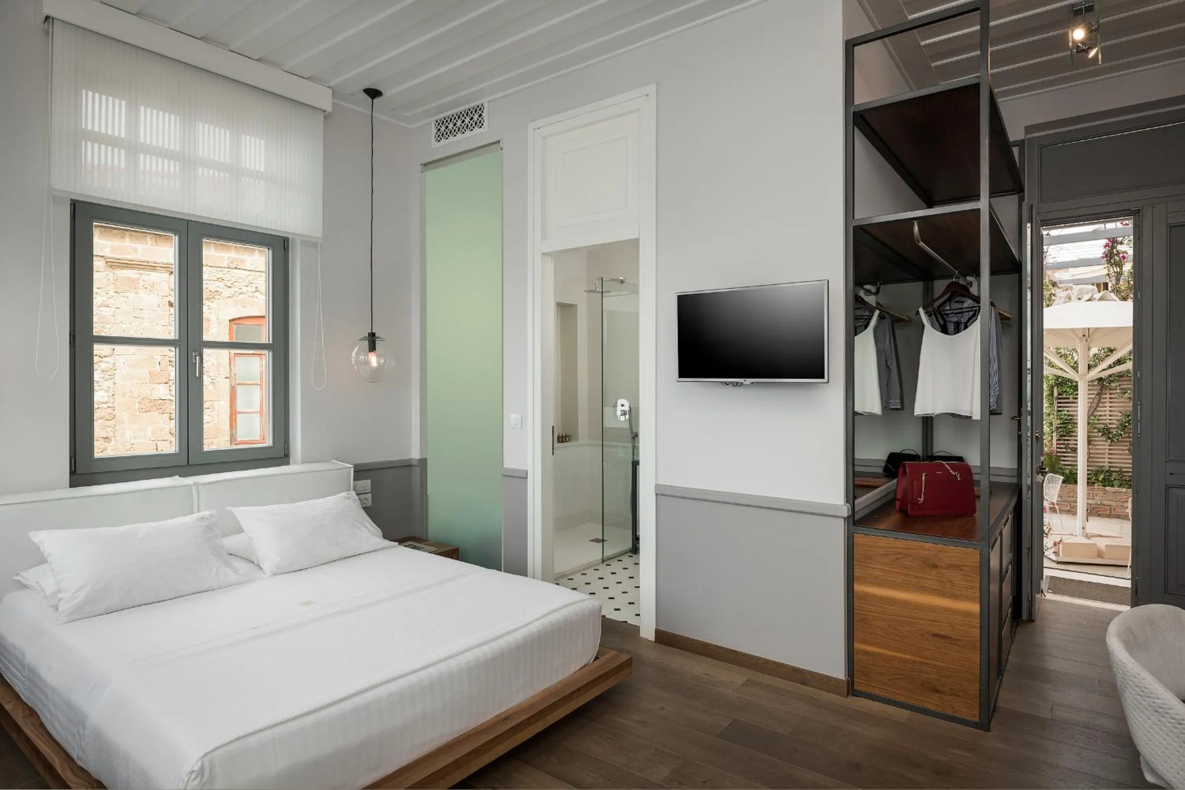 Bed in Ambassadors Residence Boutique Hotel