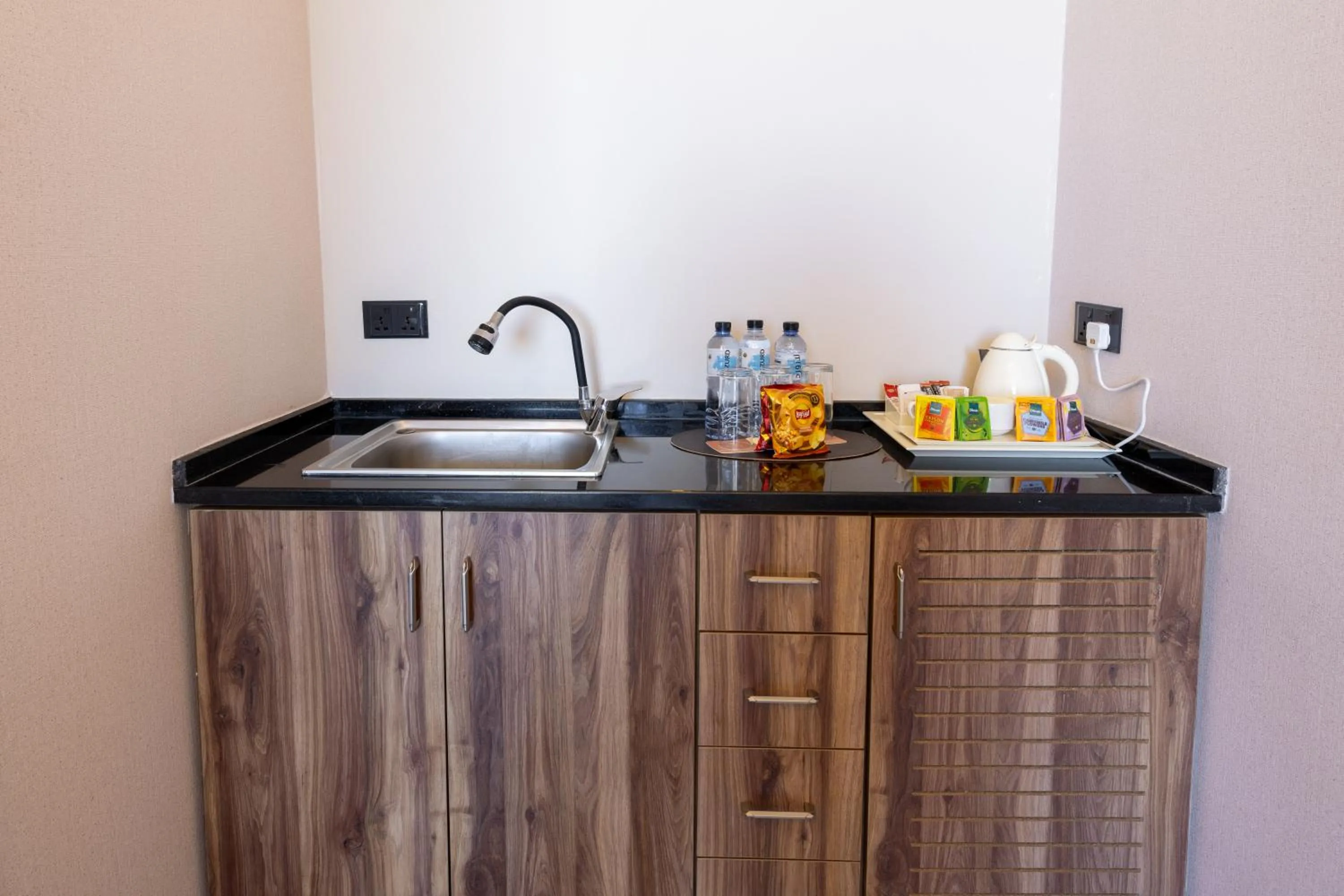 Kitchen or kitchenette in Jeddah Homes Boutique Hotel