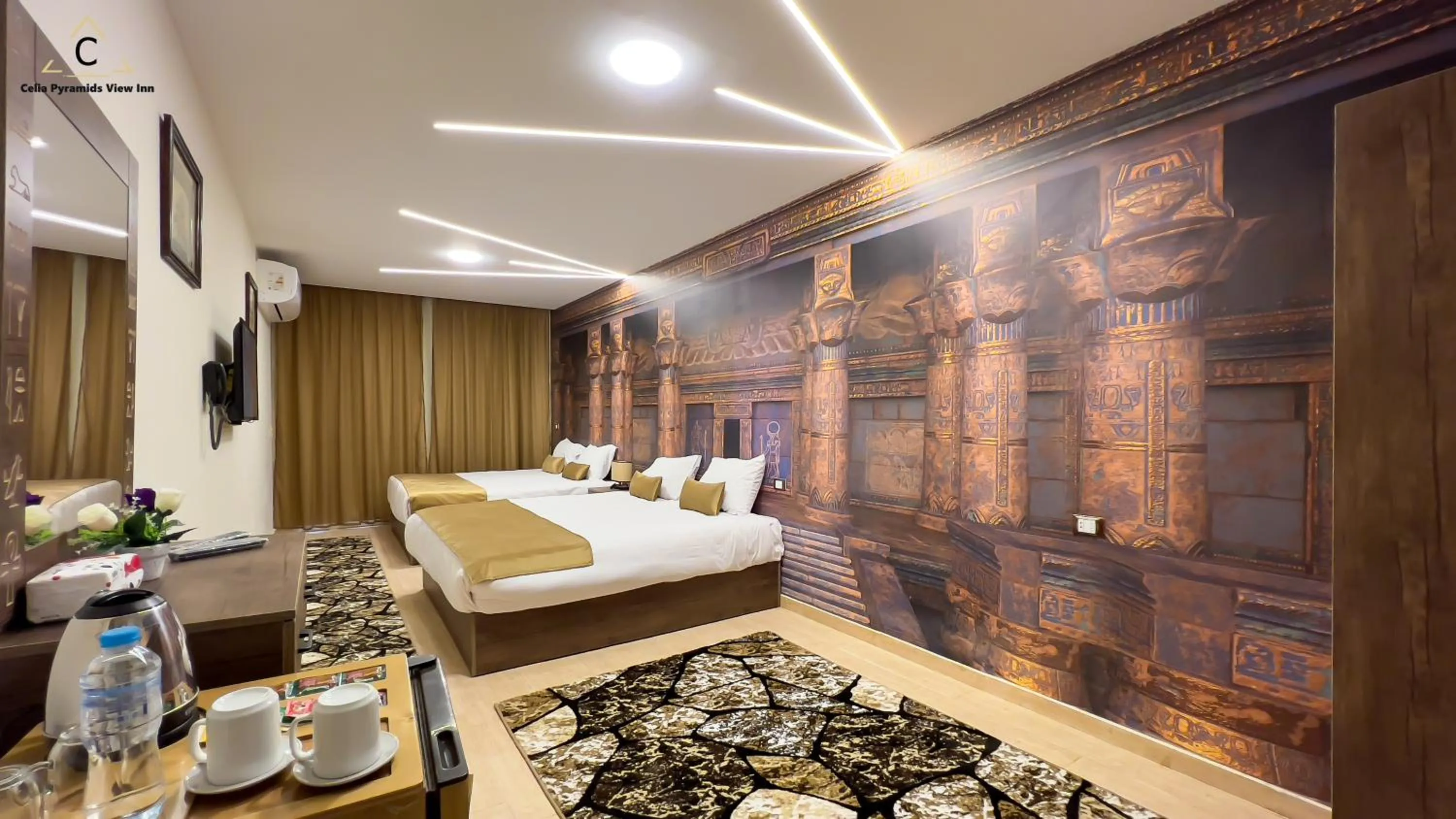 Bed in Celia Pyramids View inn