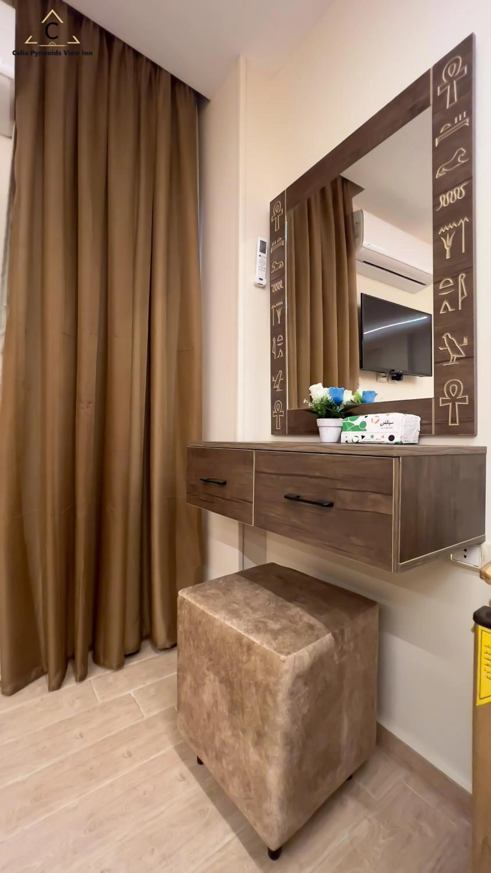 Bedroom in Celia Pyramids View inn