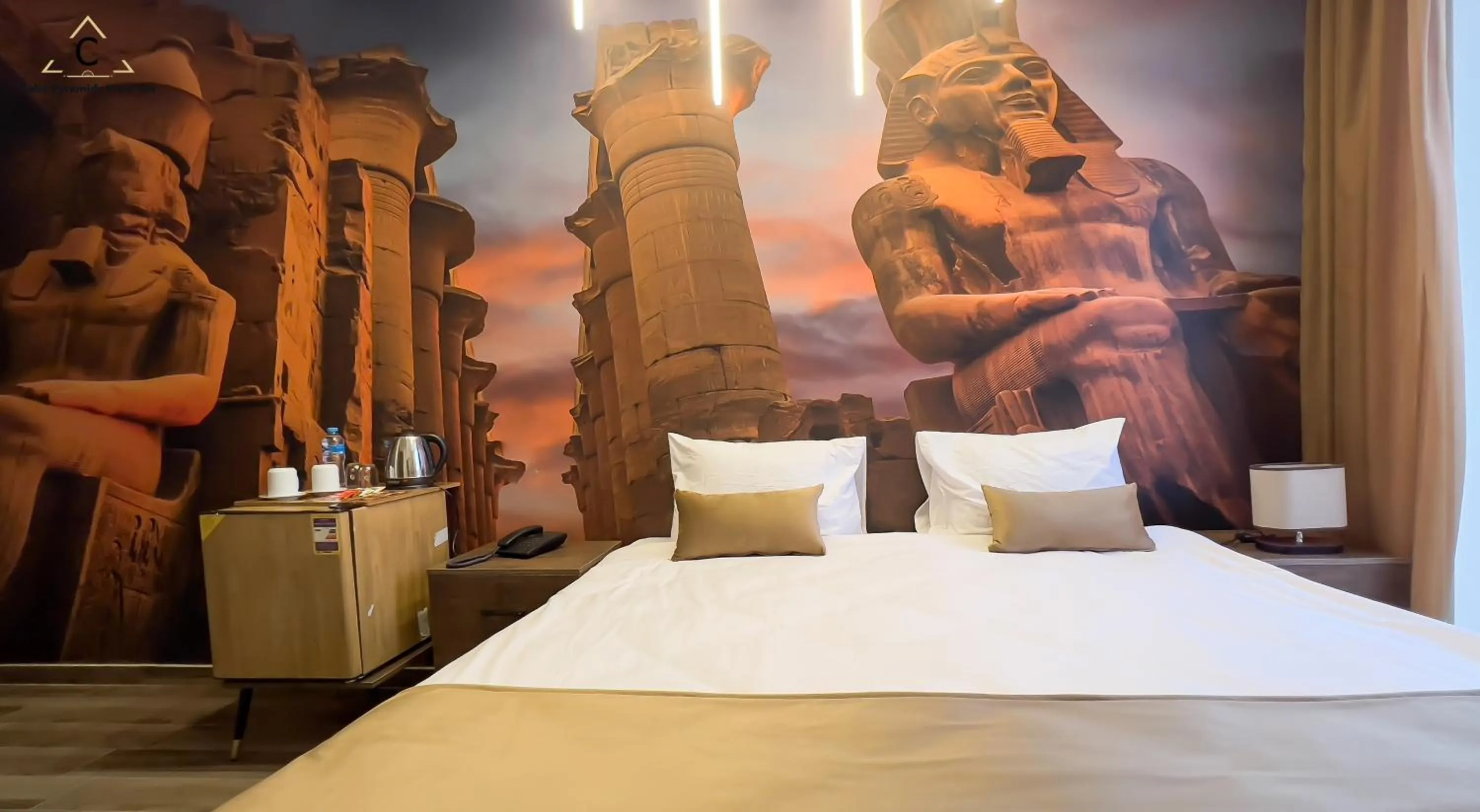 Bed in Celia Pyramids View inn